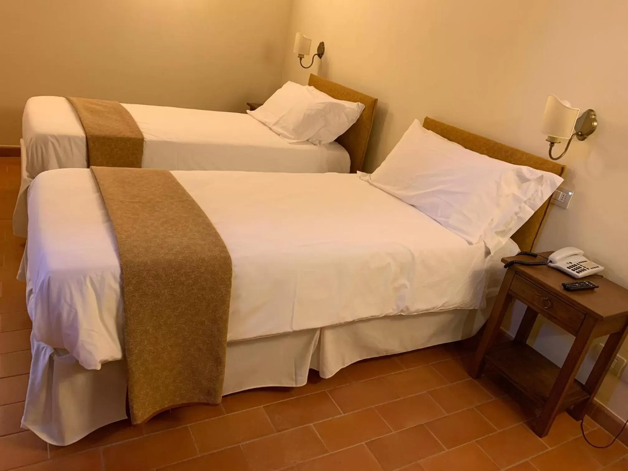 Bed in PALAZZO DE' ROSSI HOTEL