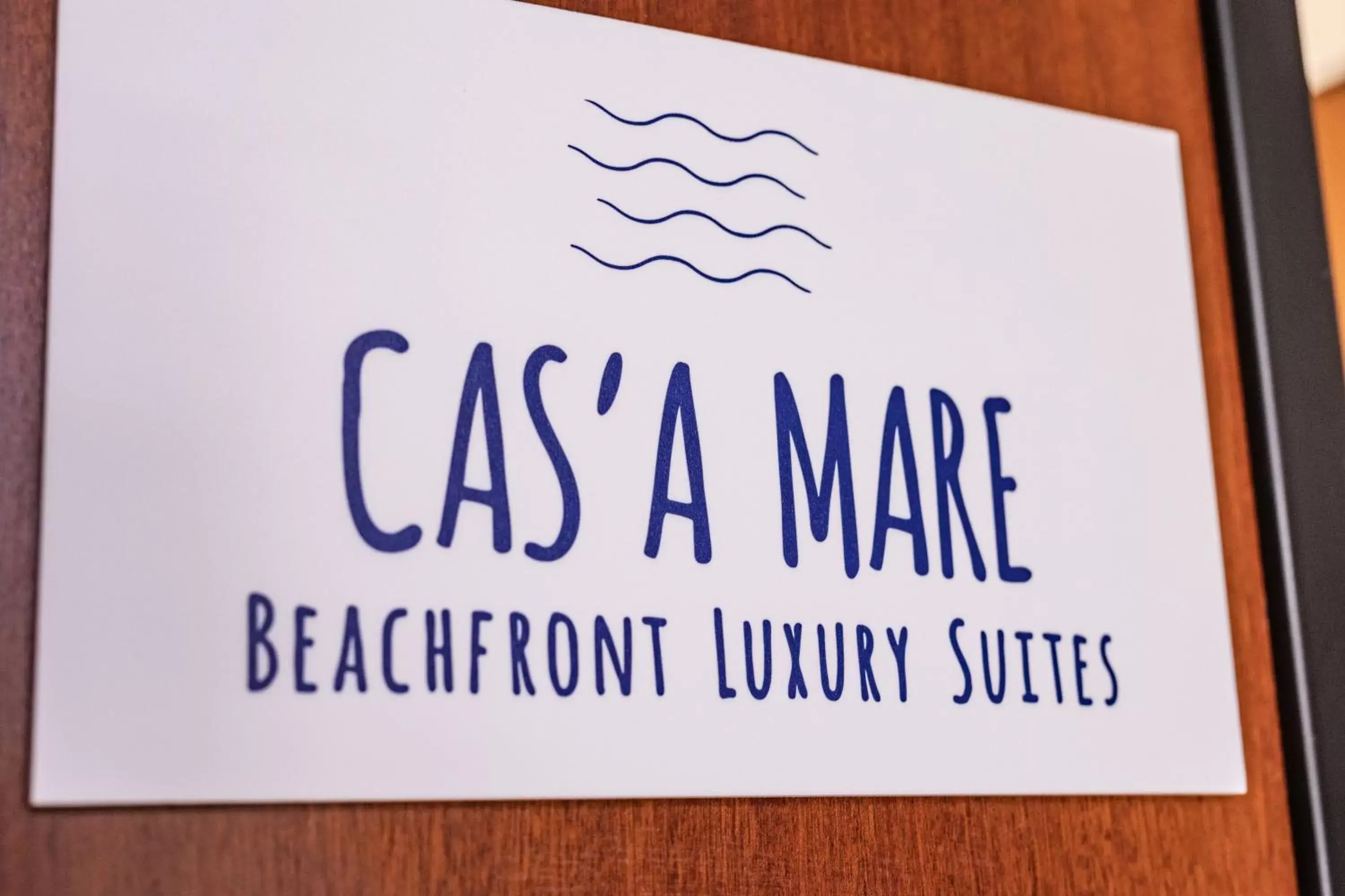 Property logo or sign in Cas’ A Mare - Beachfront Luxury Suites
