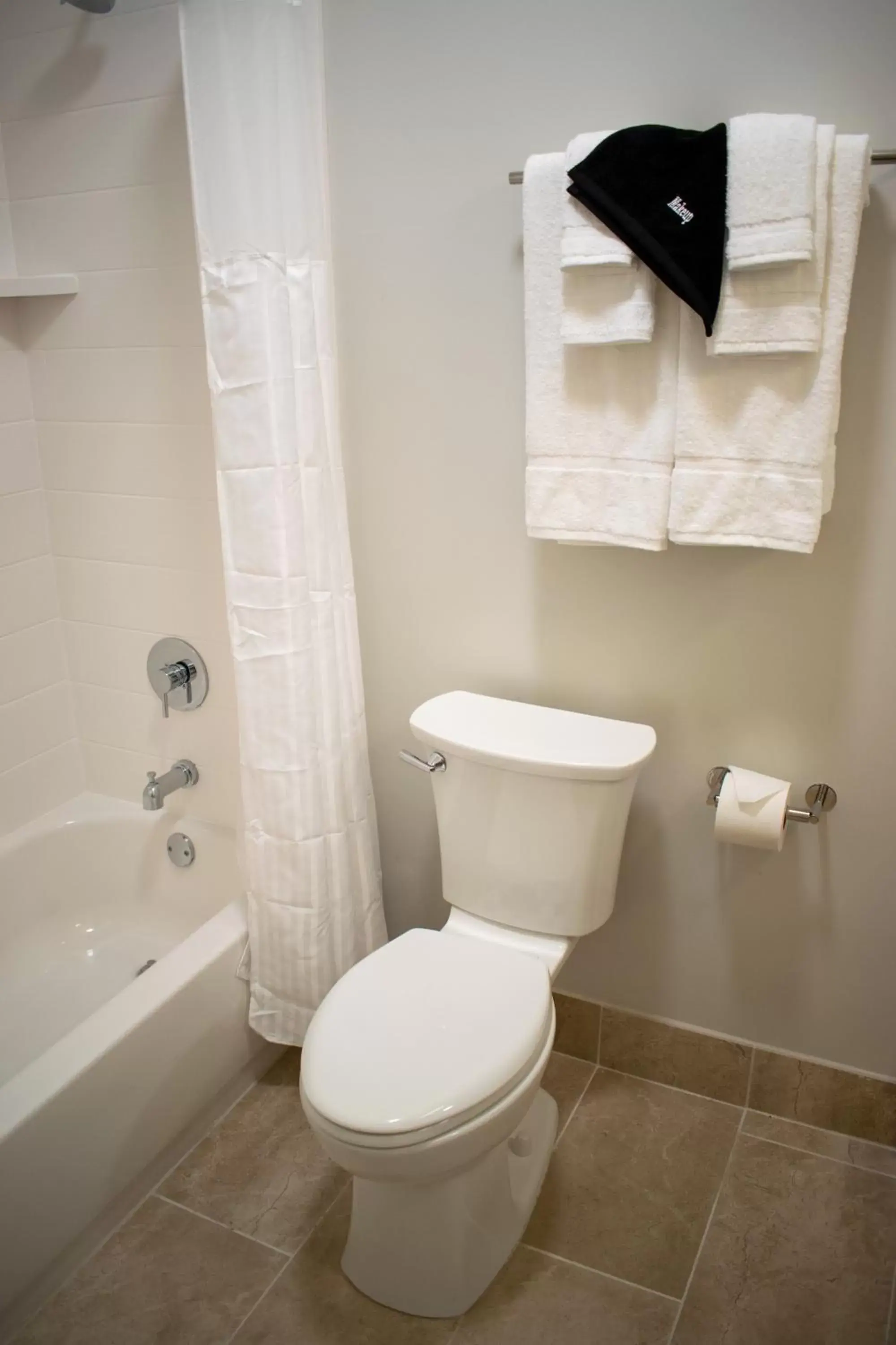 Toilet, Bathroom in Oasis Resort Gulfport