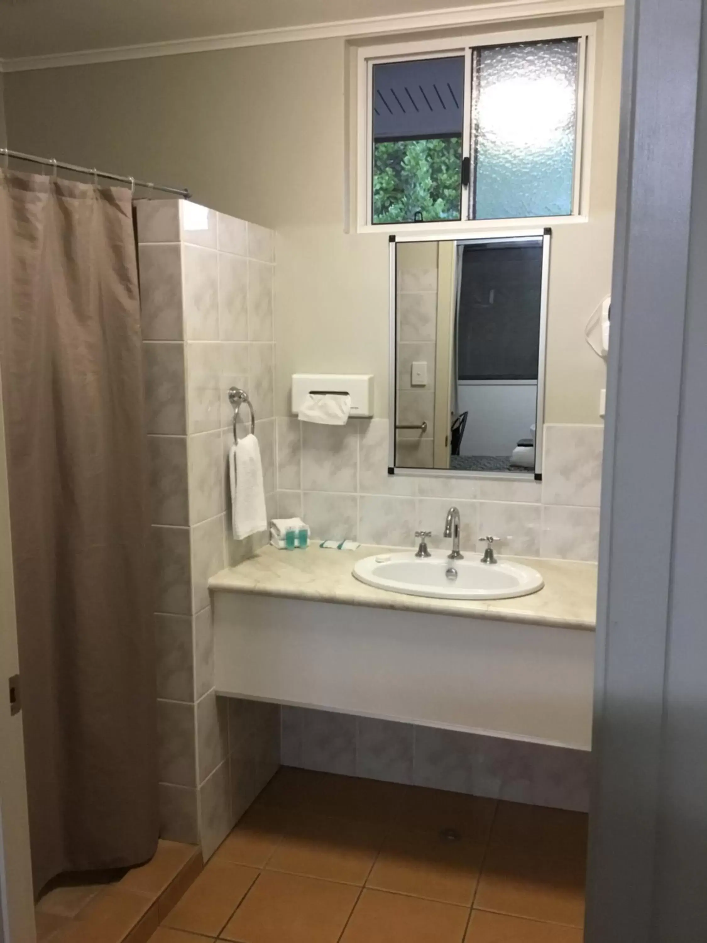 Bathroom in Golden Palms Motor Inn