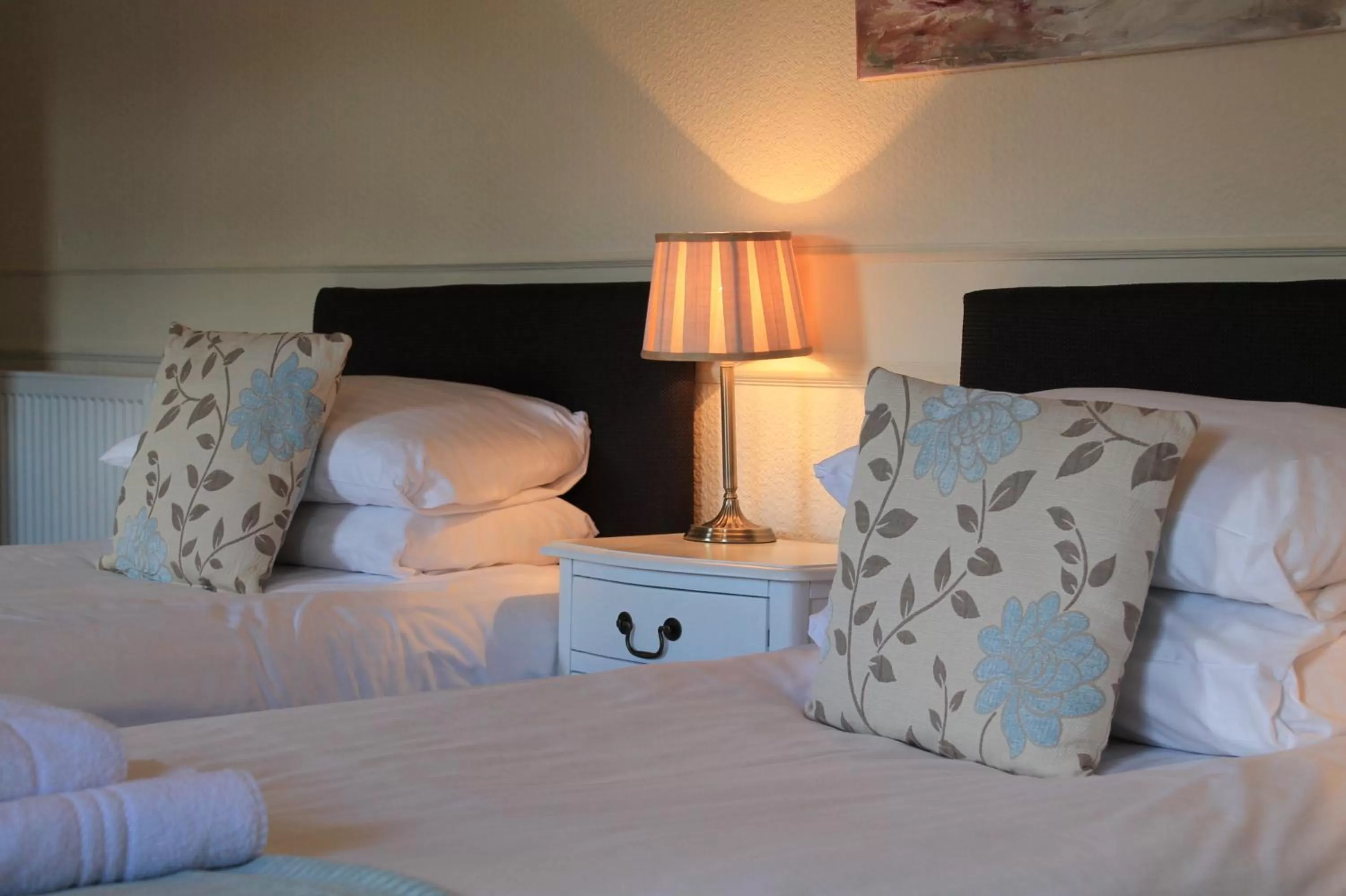 Decorative detail, Bed in Old Court Hotel & Apartments