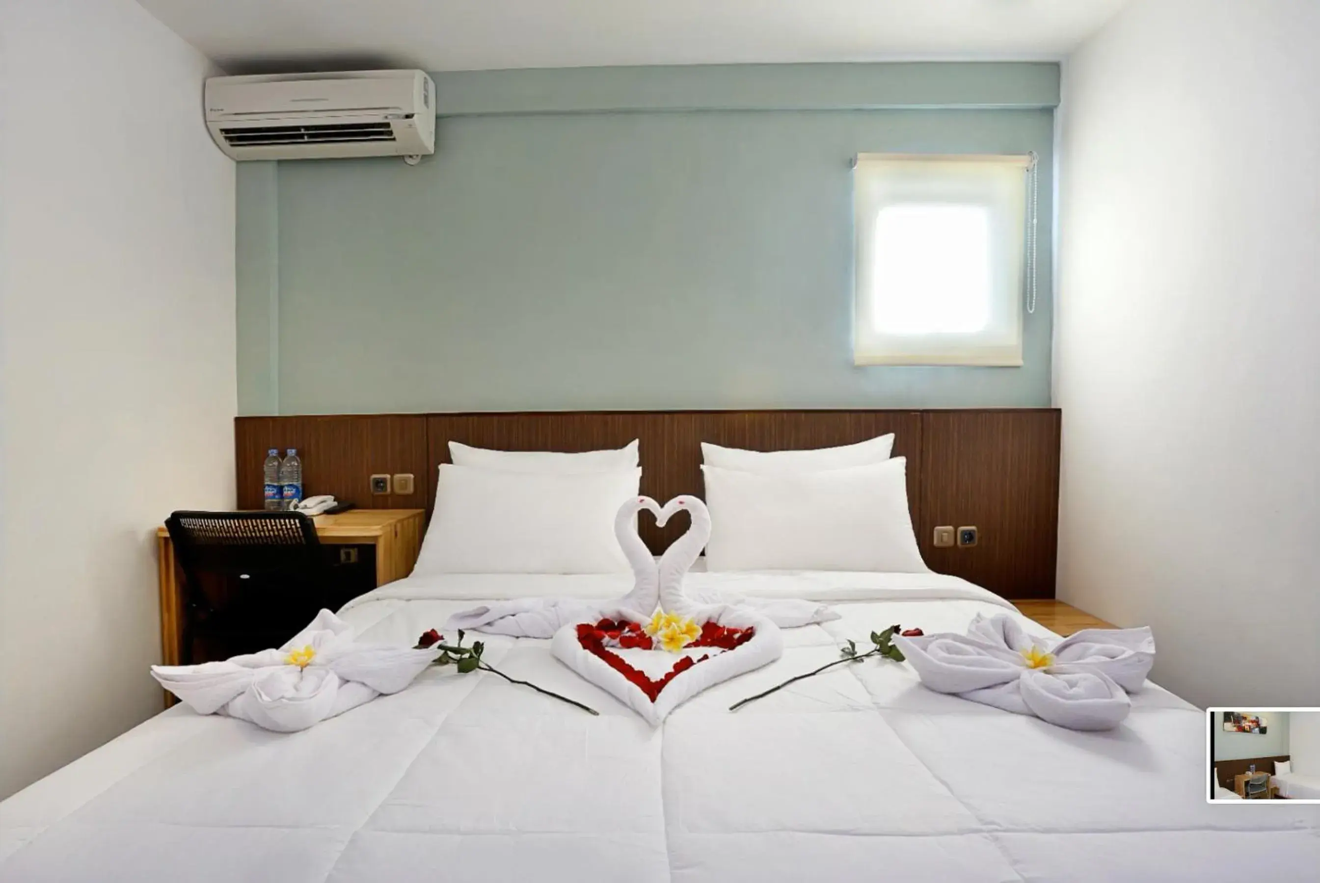 Bed in Duo Legian Hotel