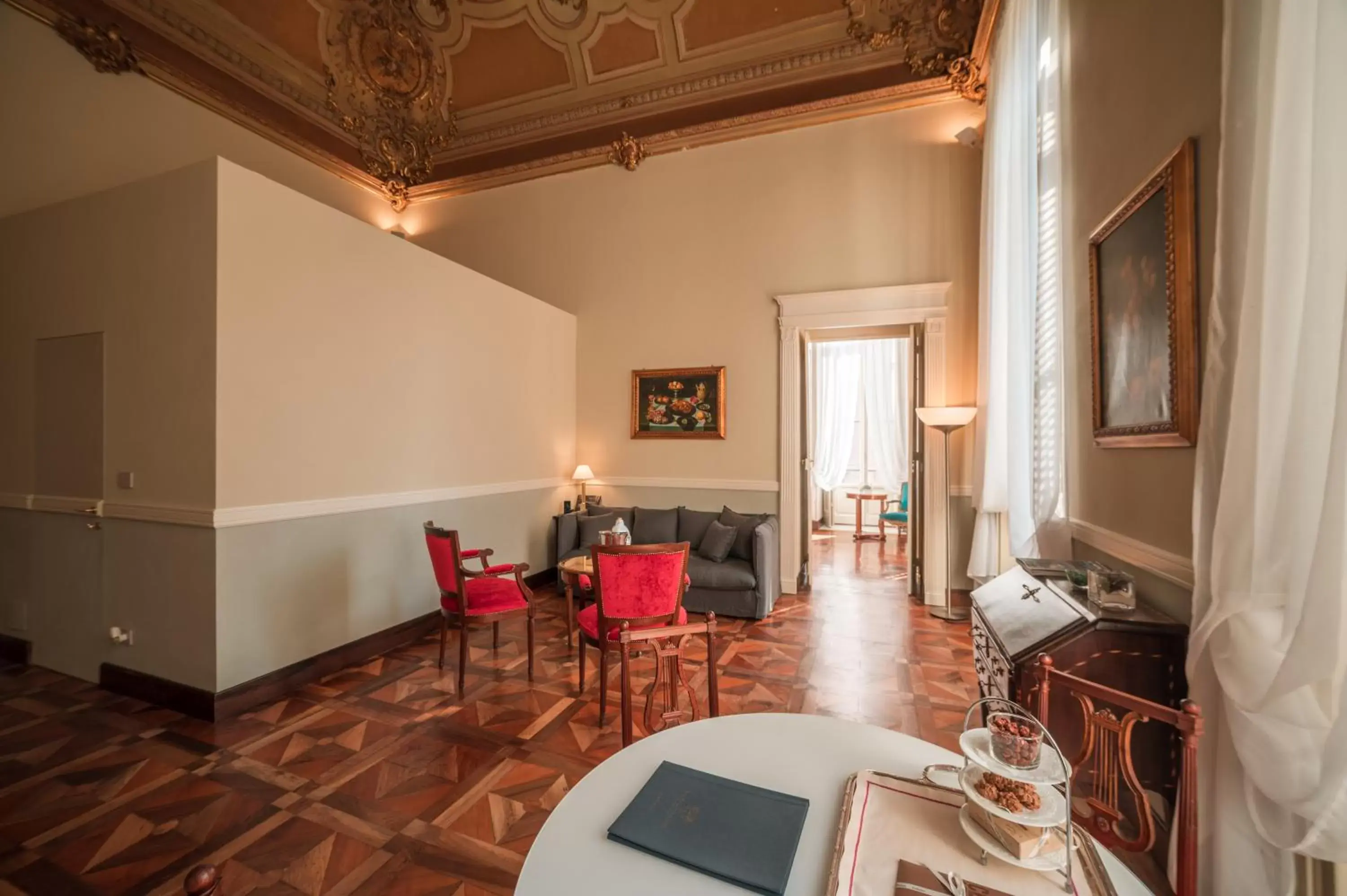 Living room, Dining Area in Royal Palace Hotel