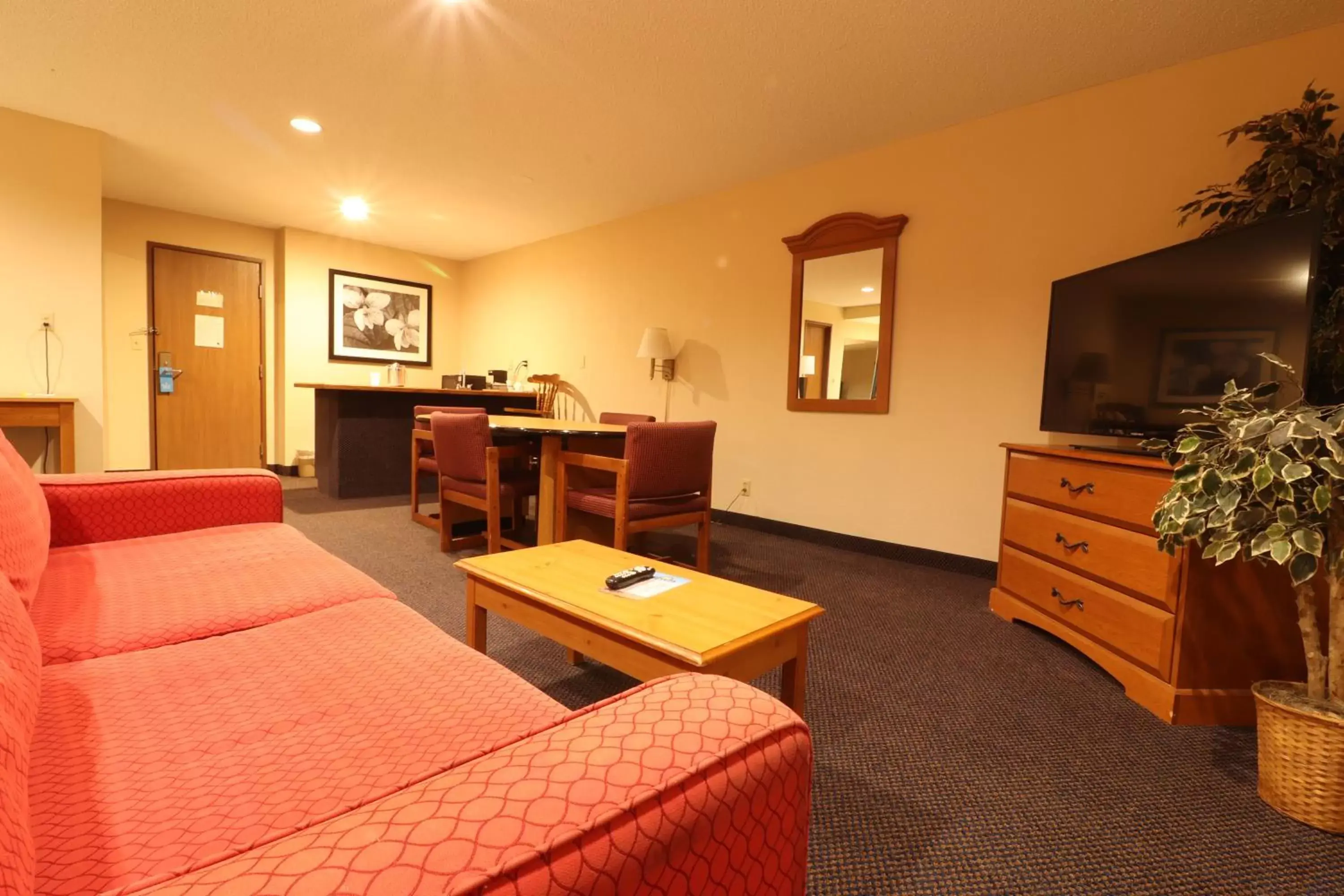 Seating Area in Days Inn by Wyndham Black River Falls - Access to ATV Trail