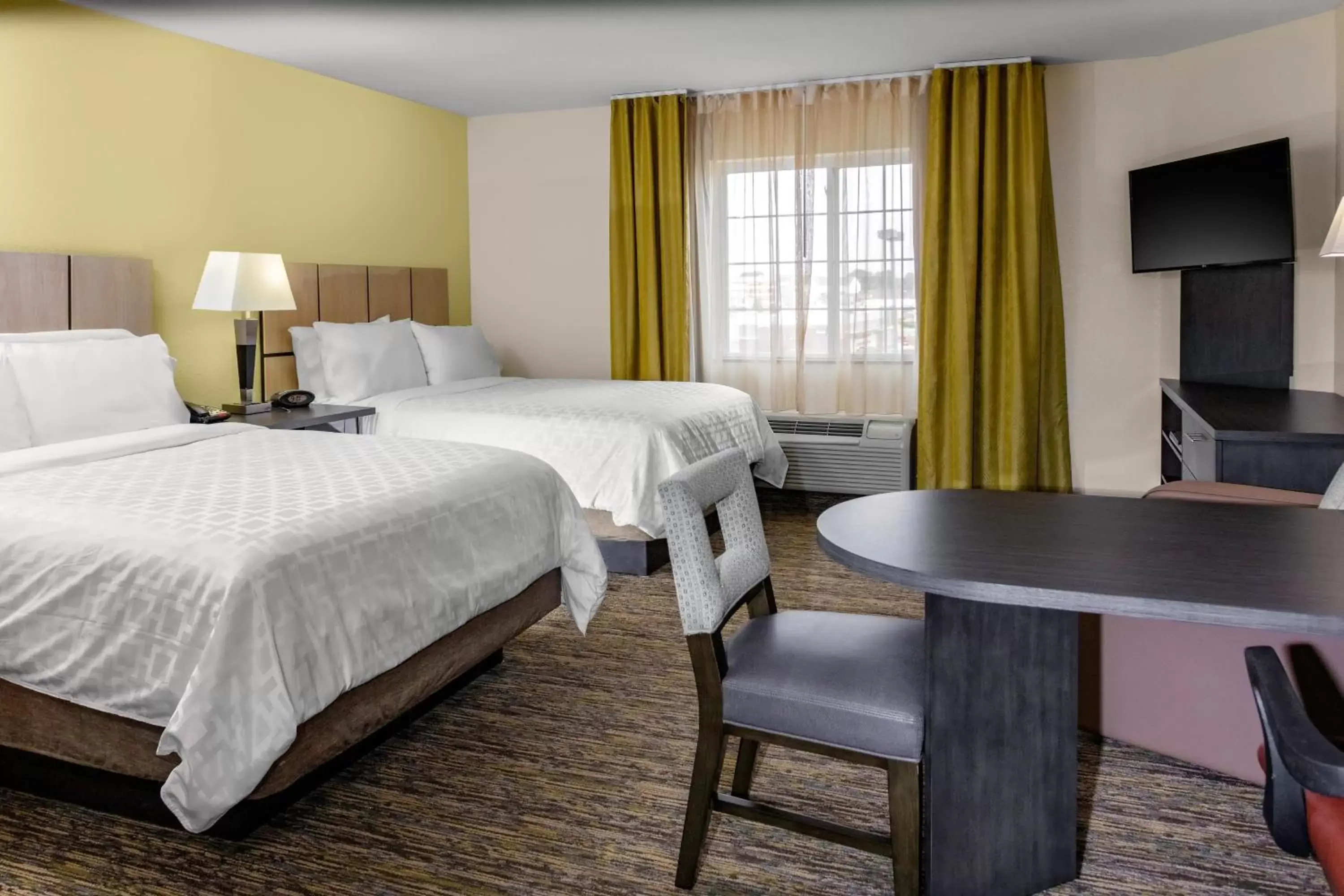 Bedroom, Bed in Candlewood Suites Warner Robins, an IHG Hotel