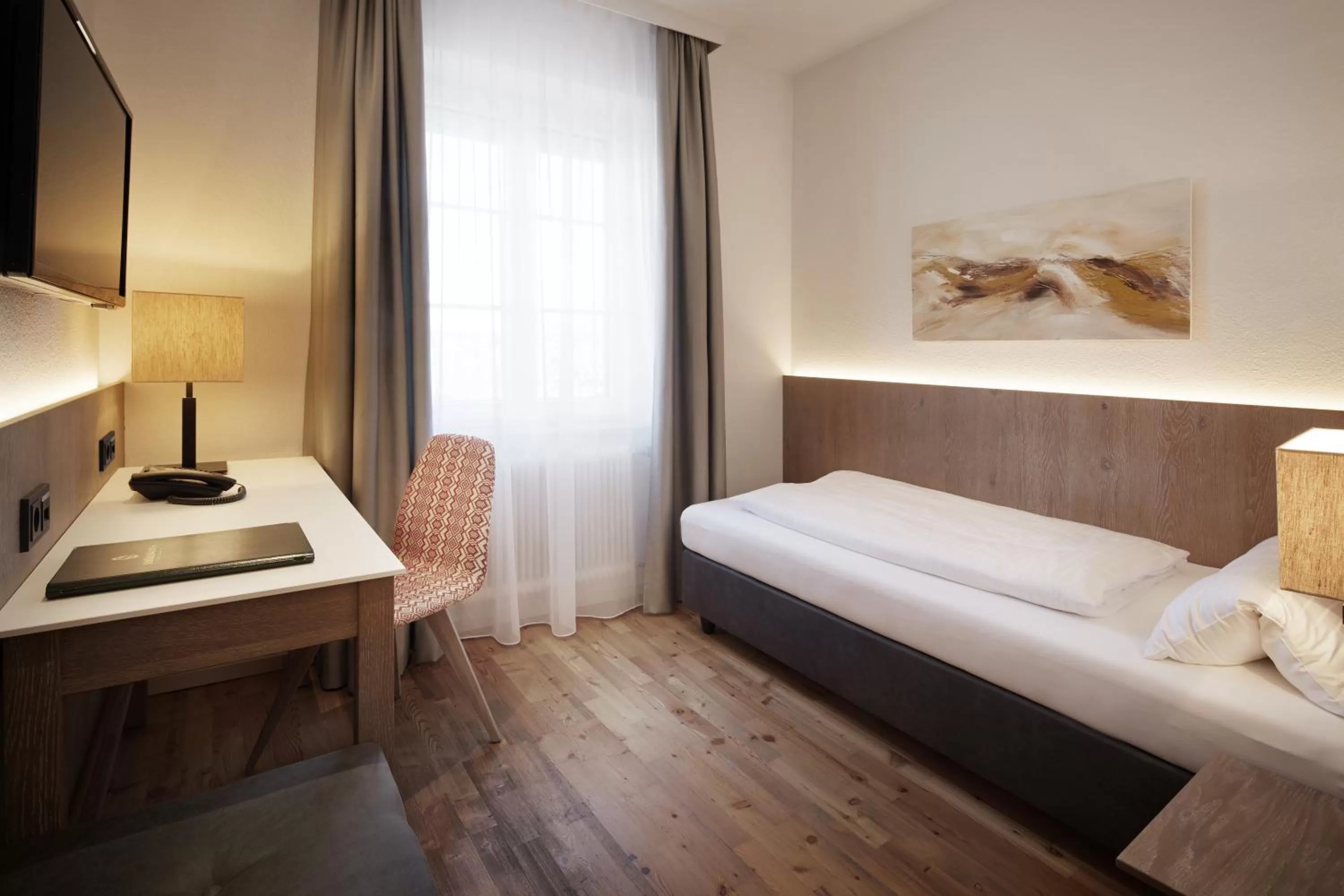 Photo of the whole room, Bed in Schüdlbauer´s Hotel-Restaurant-Bar