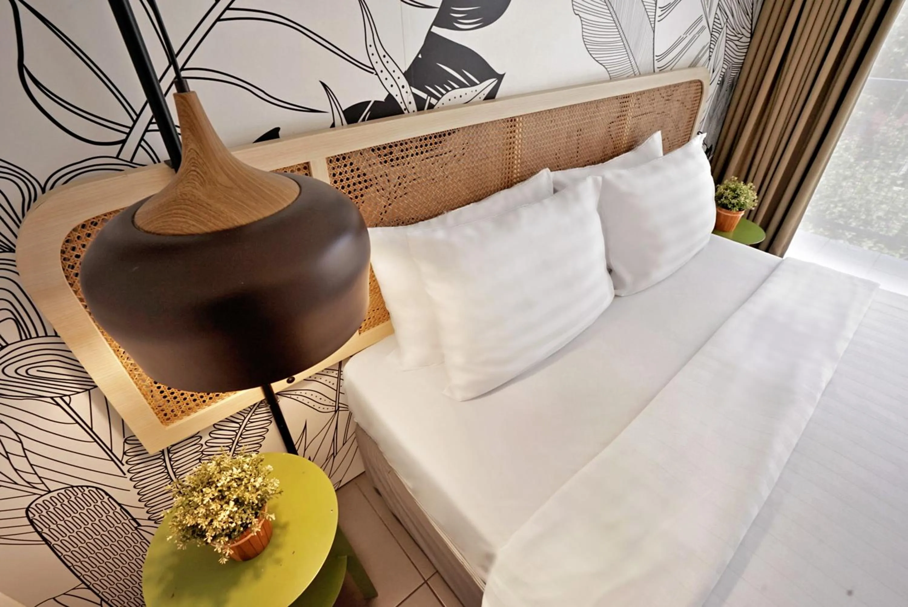 Bed in Malaka Hotel Bandung