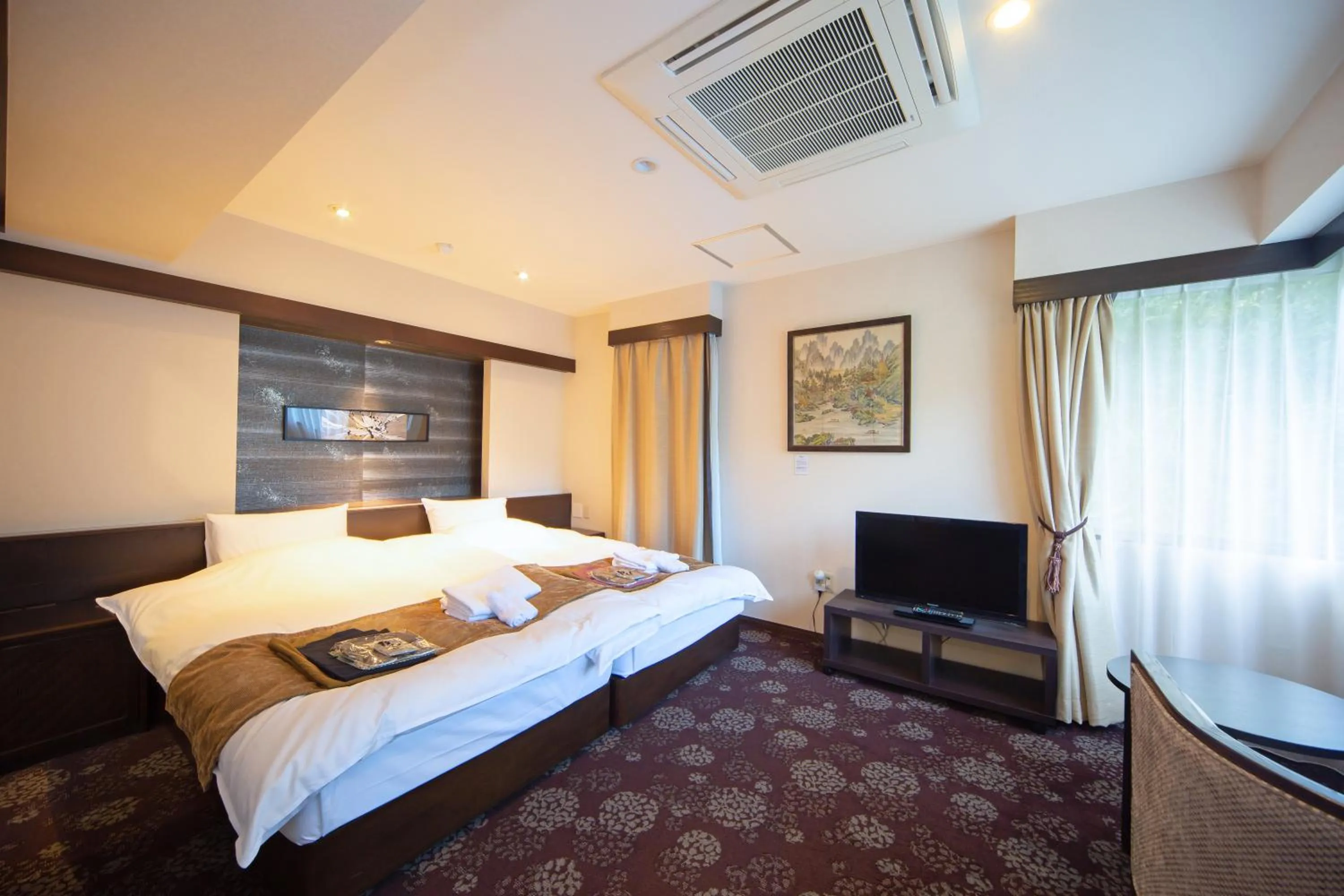 Photo of the whole room, Bed in Art & Music Spa Resort Manatei Hakone