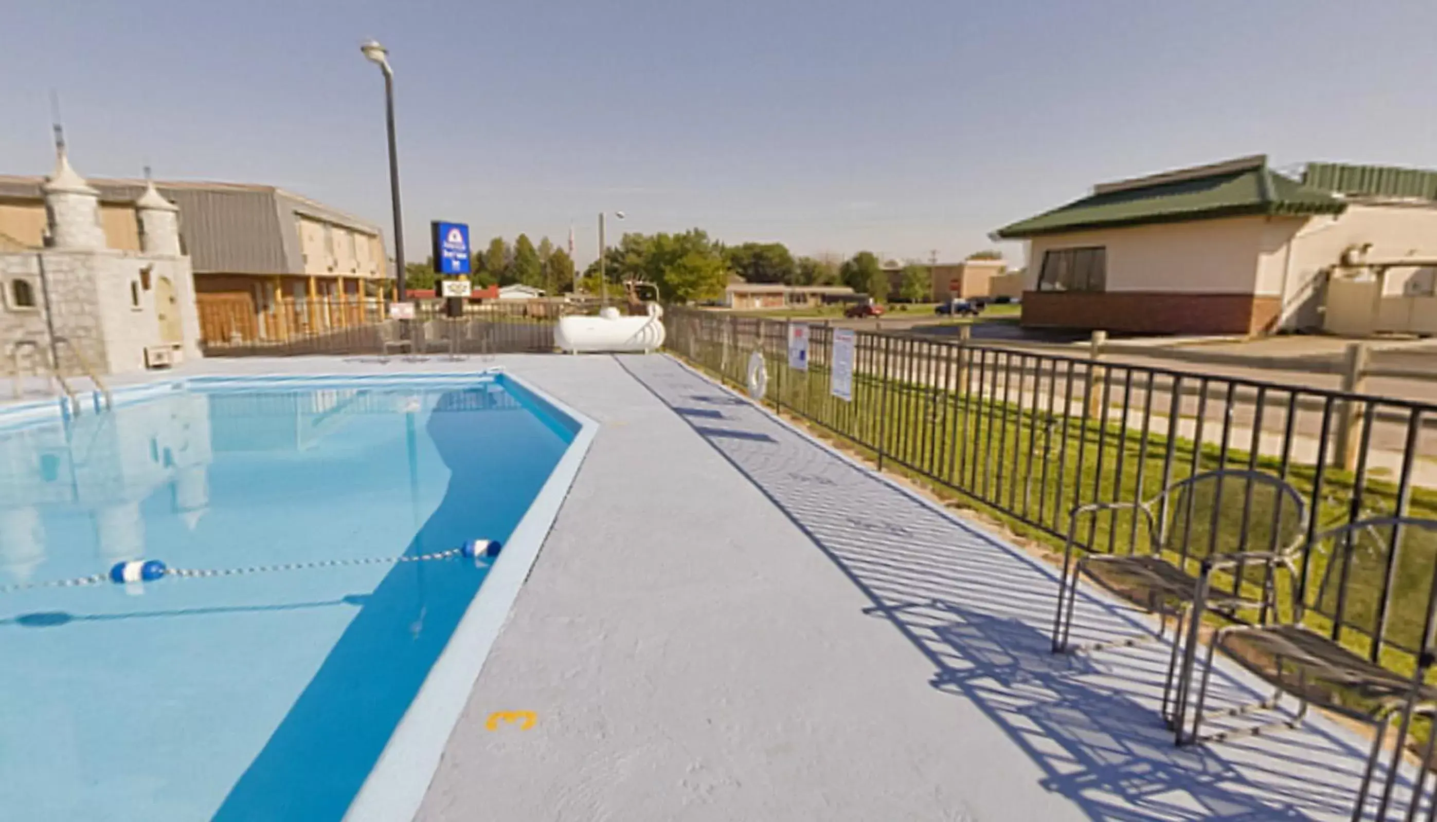 Swimming pool in Americas Best Value Inn Wall Swimming pool in Americas Best Value Inn Wall