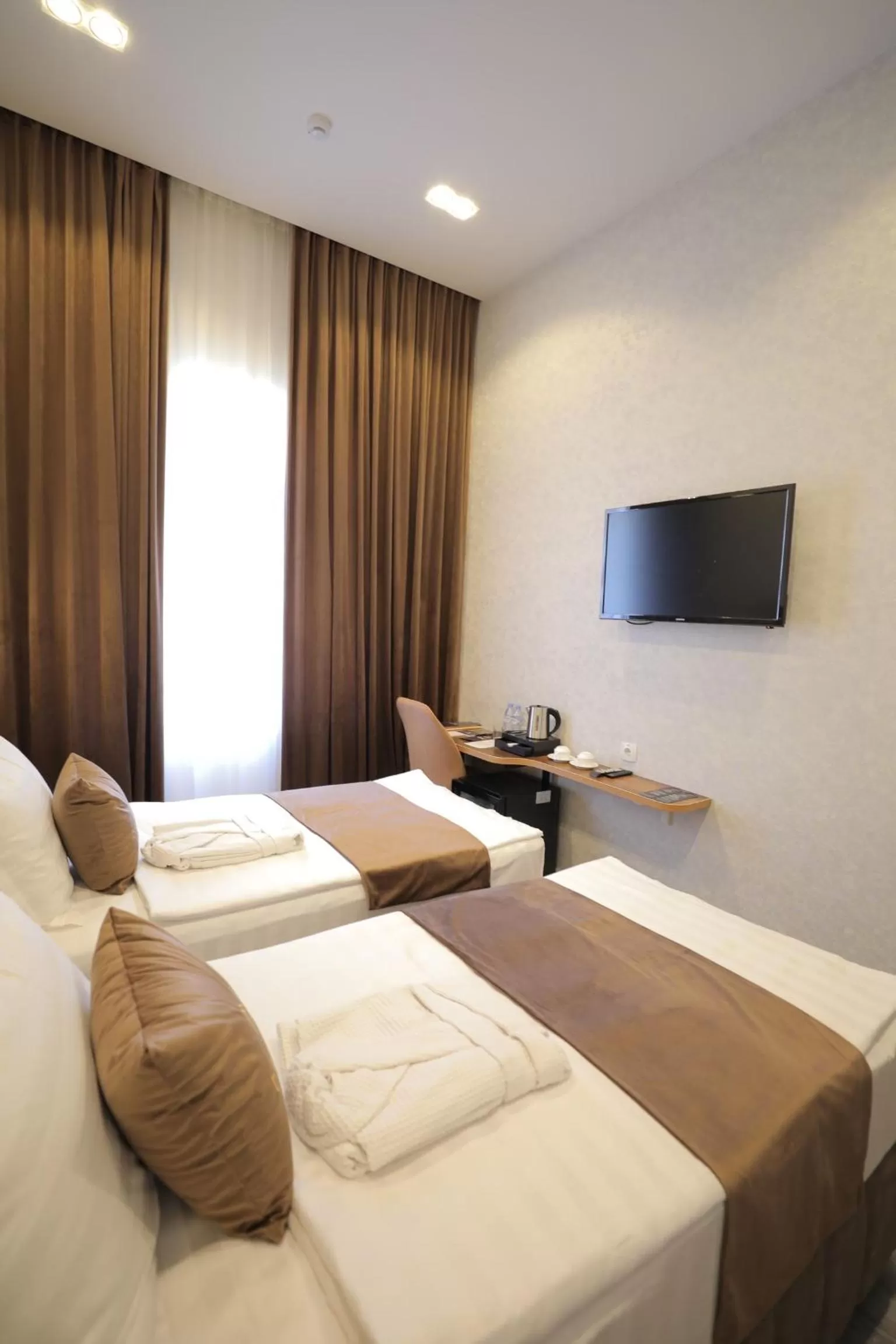 Bed in MaxWell Hotel & SPA