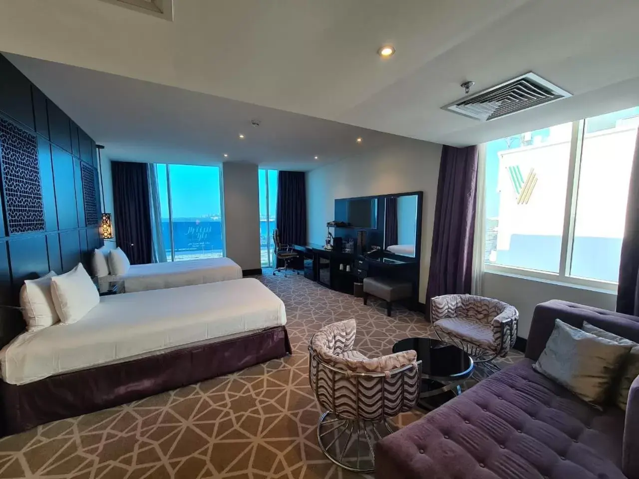 Bedroom, Seating Area in Holiday Inn Dubai Al Barsha, an IHG Hotel