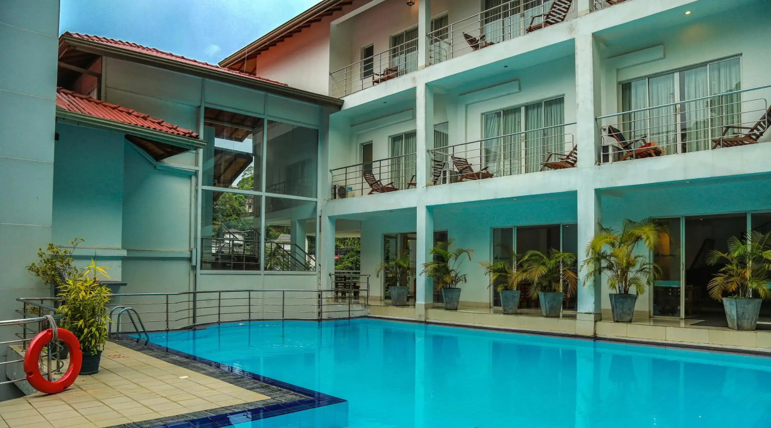 Swimming pool, Property Building in Senani Hotel