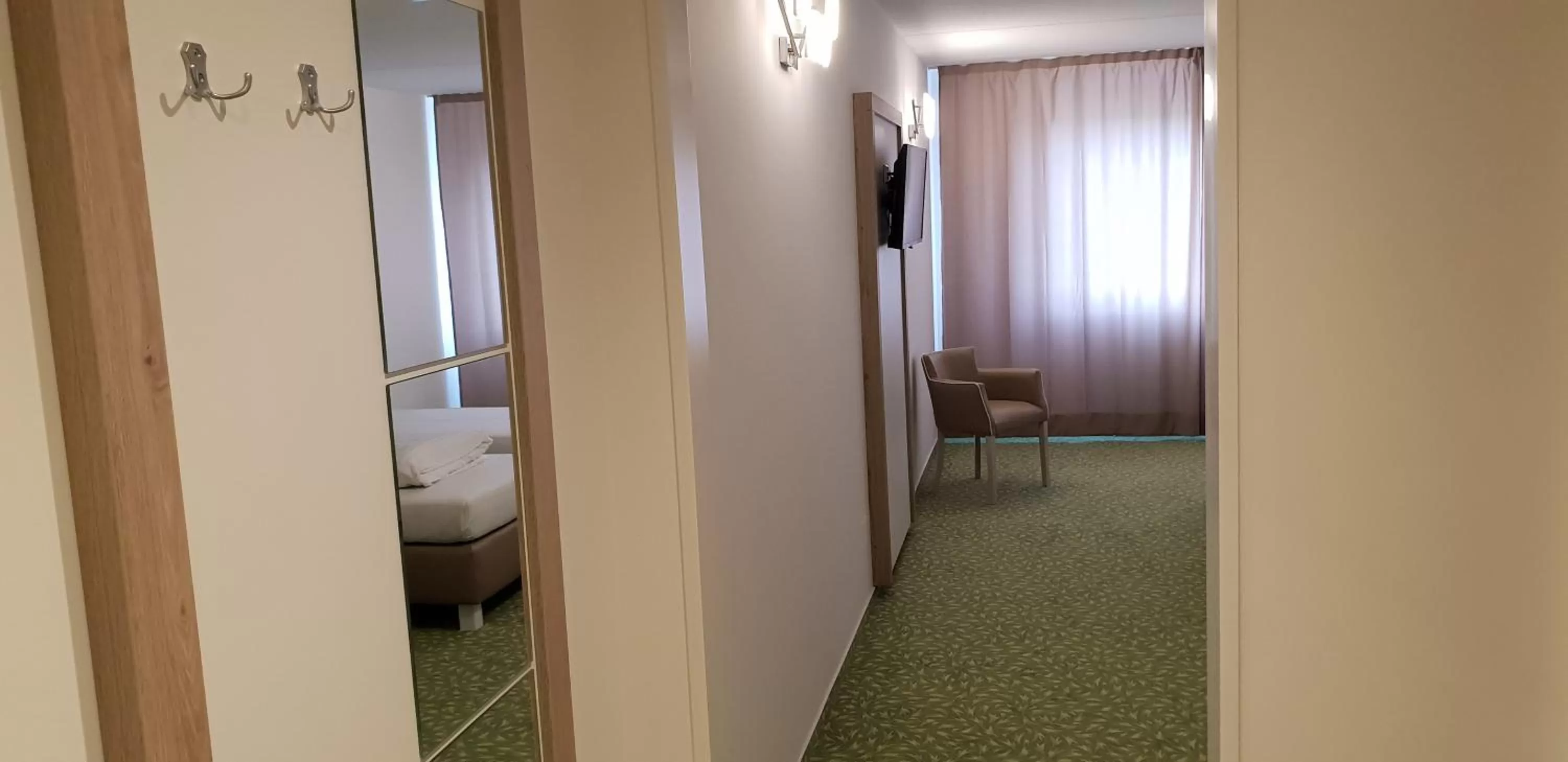 Bed in Confour Hotel