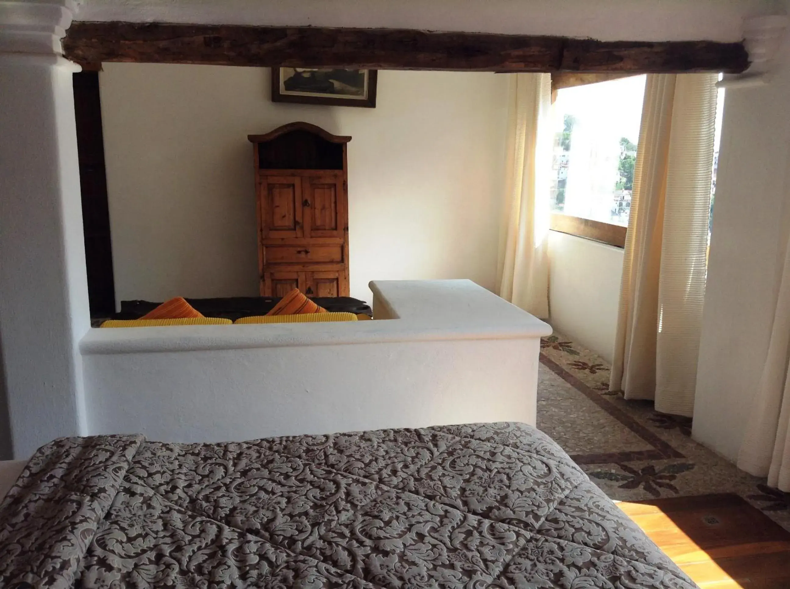 Bed in Posada de la Mision, Hotel Museo y Jardin