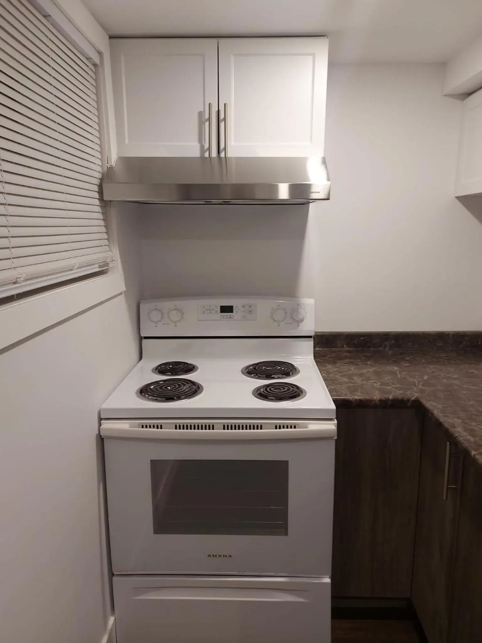 Kitchen/Kitchenette in Auberge Motel LA RÉFÉRENCE