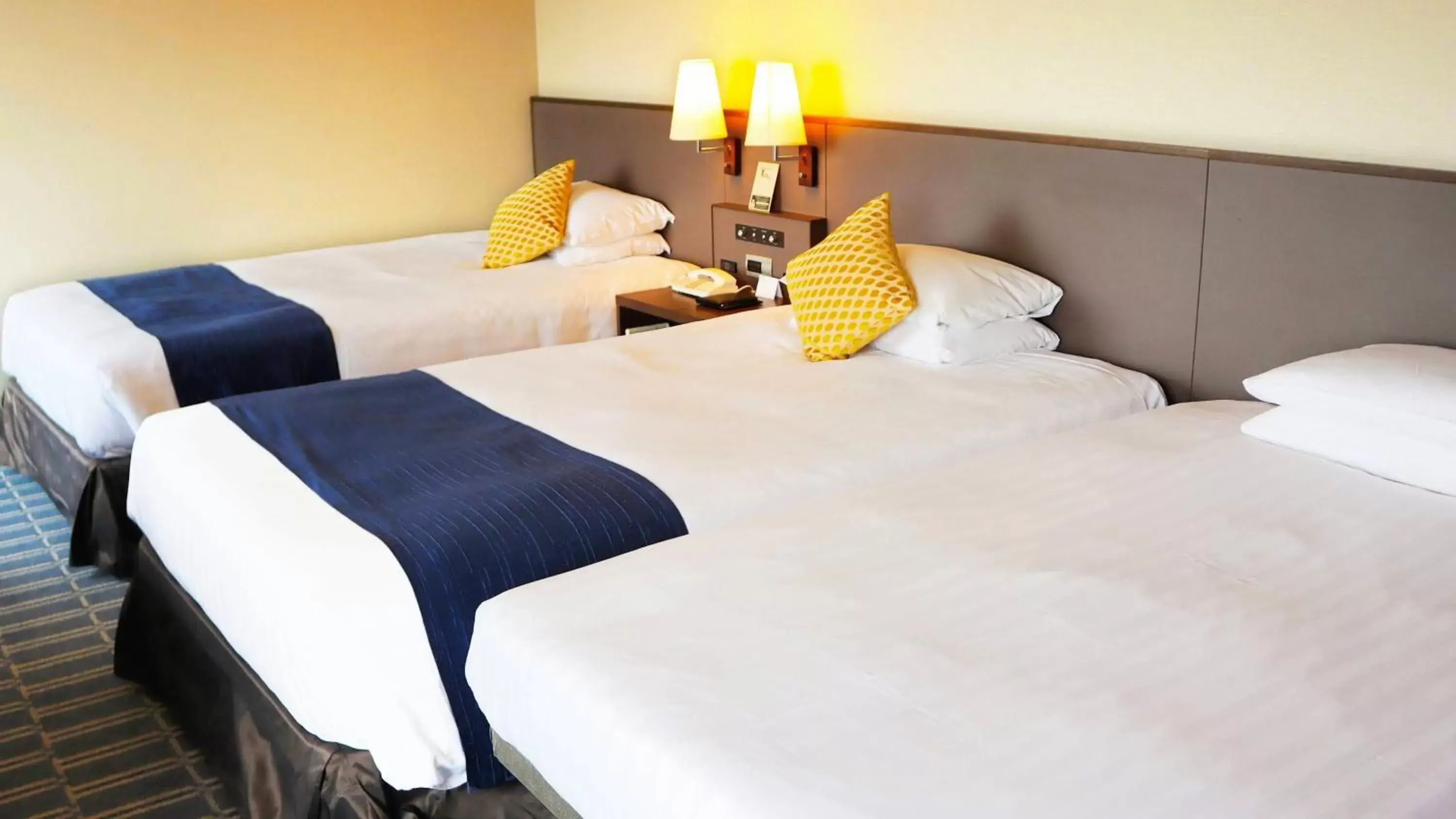 Bed in Premier Hotel Nakajima Park Sapporo
