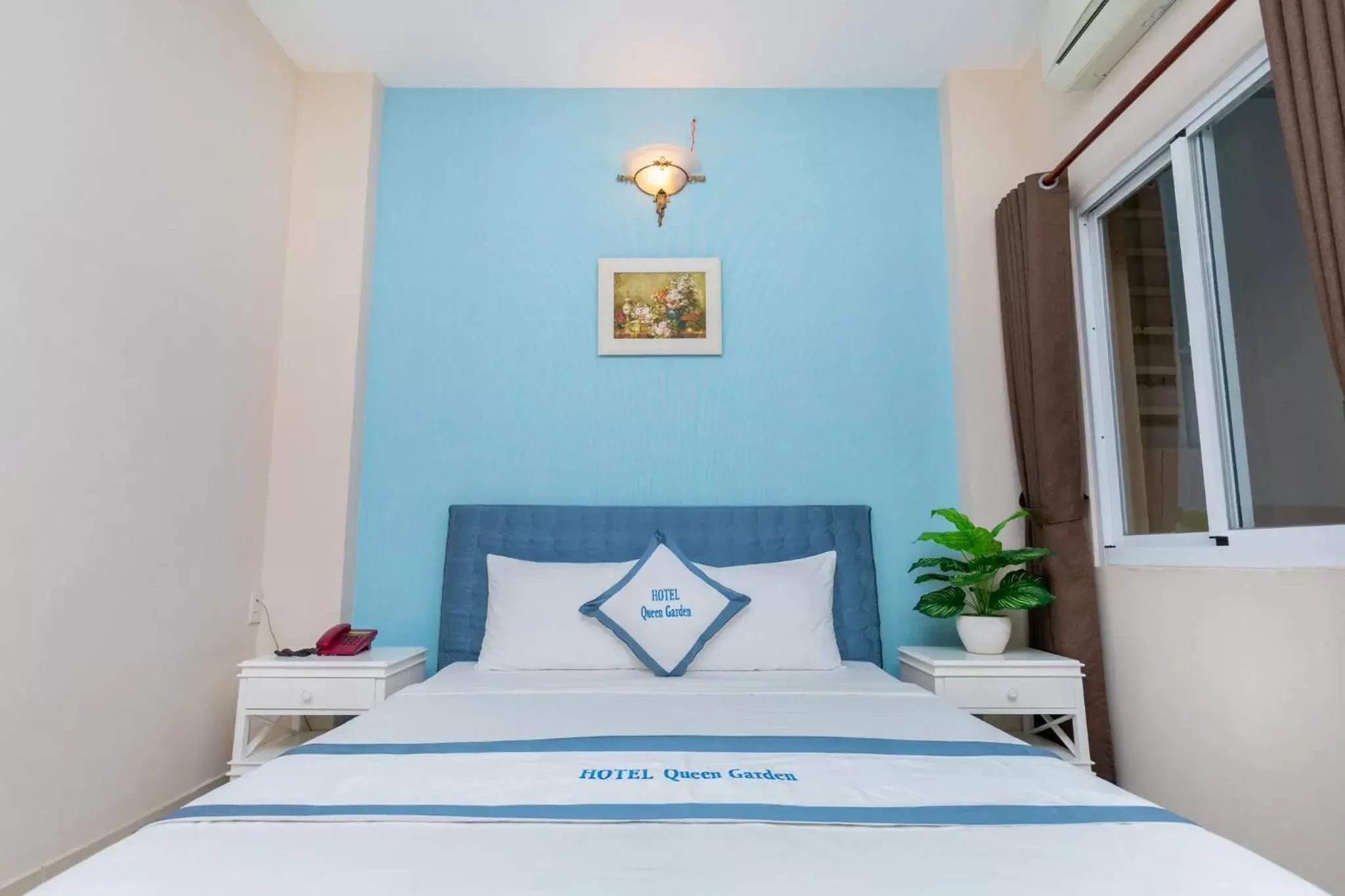 Bed in Queen Garden Hotel & Apartment Bed in Queen Garden Hotel & Apartment