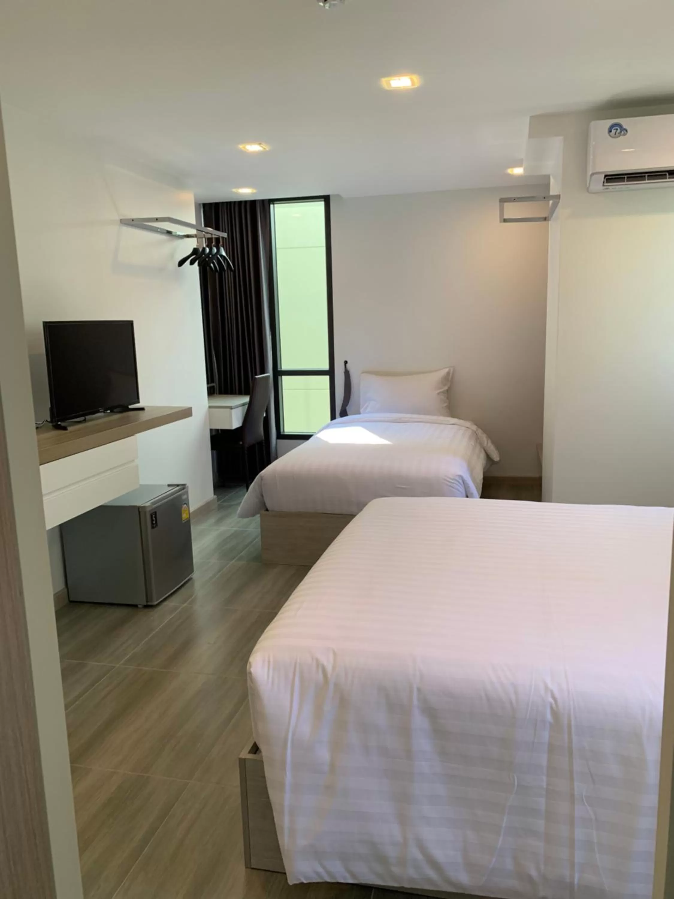 Bed in Thana Wisut Hotel