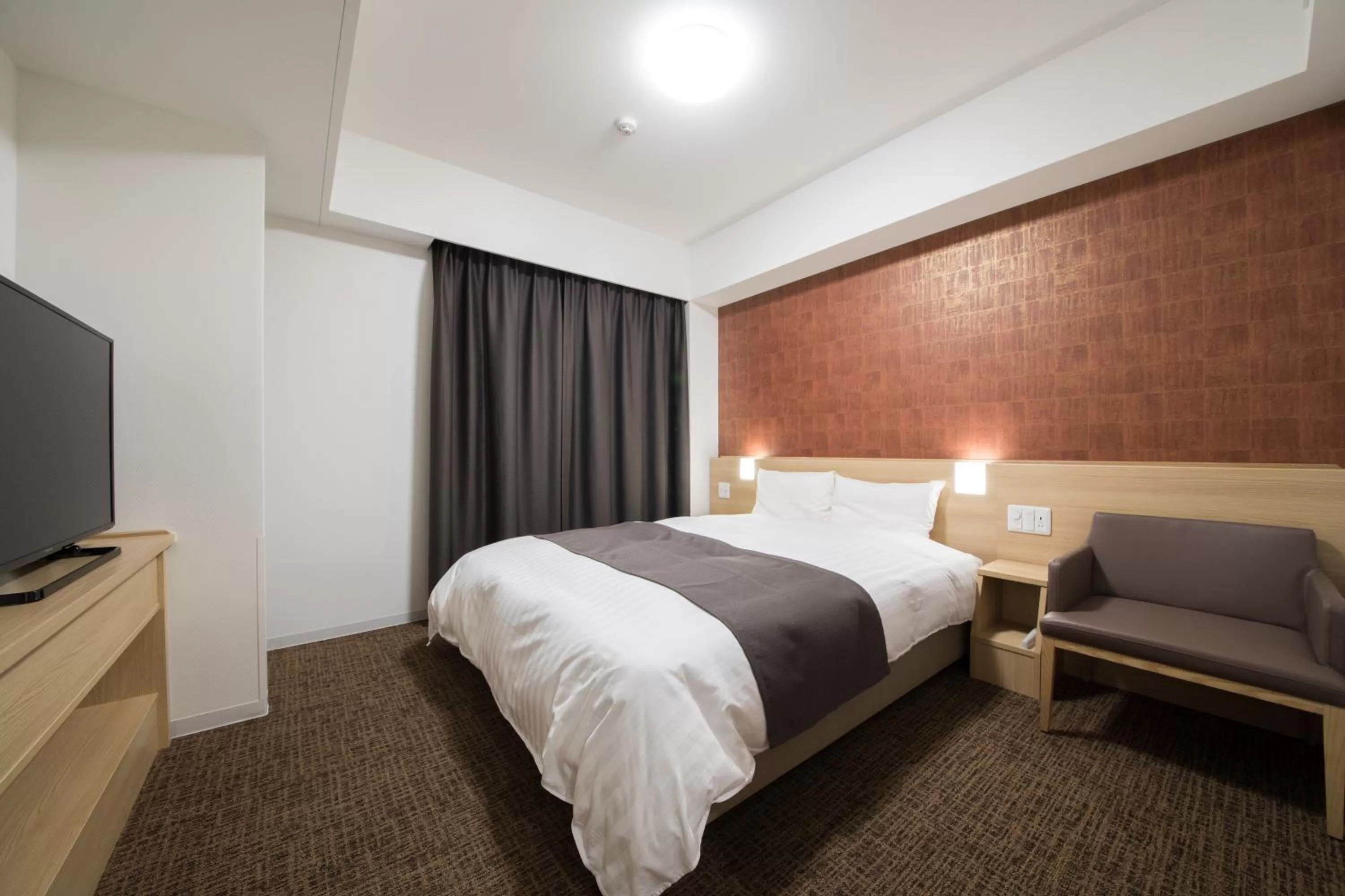 Photo of the whole room, Bed in Dormy Inn Matsuyama Natural Hot Spring