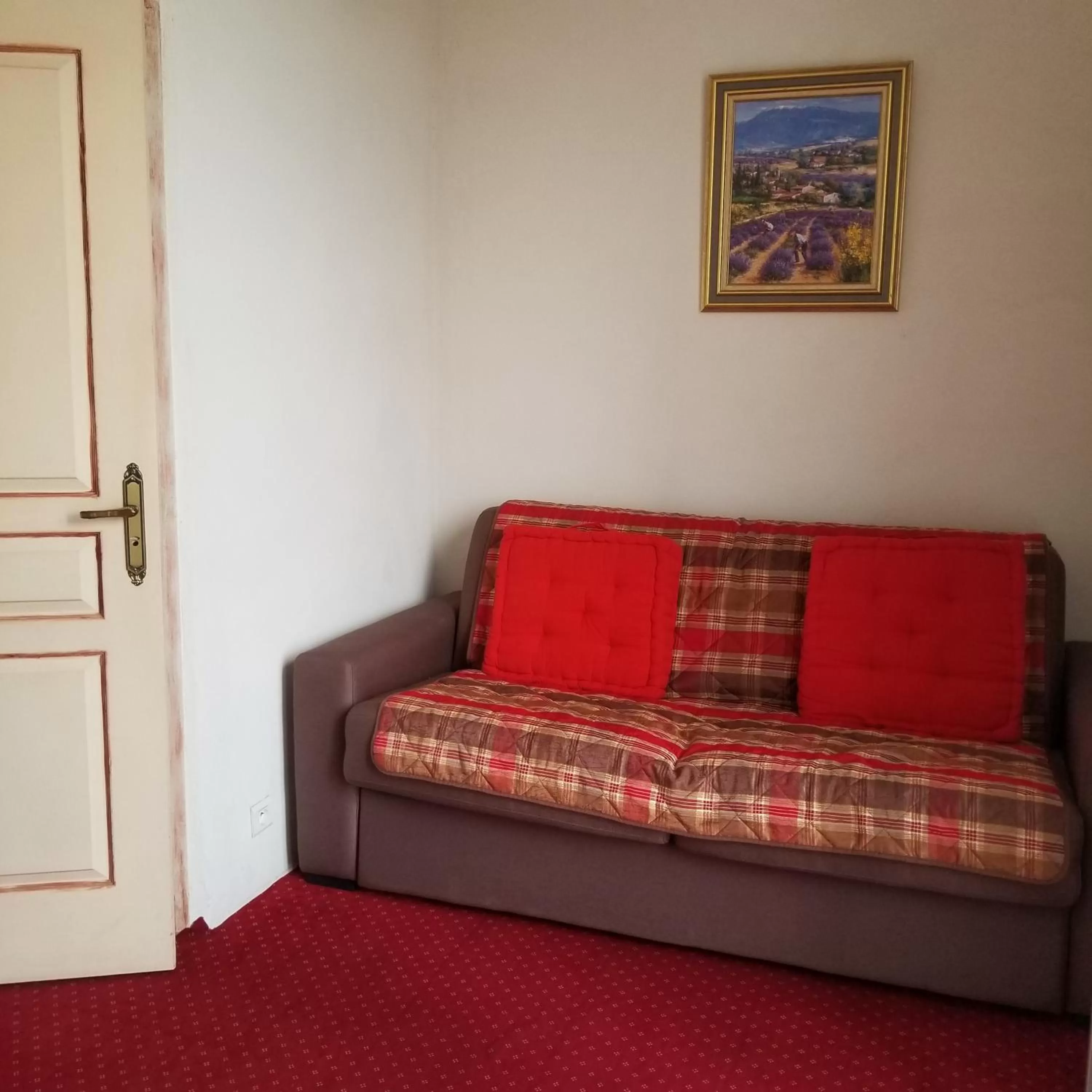 Seating area in Logis hôtel du terreau