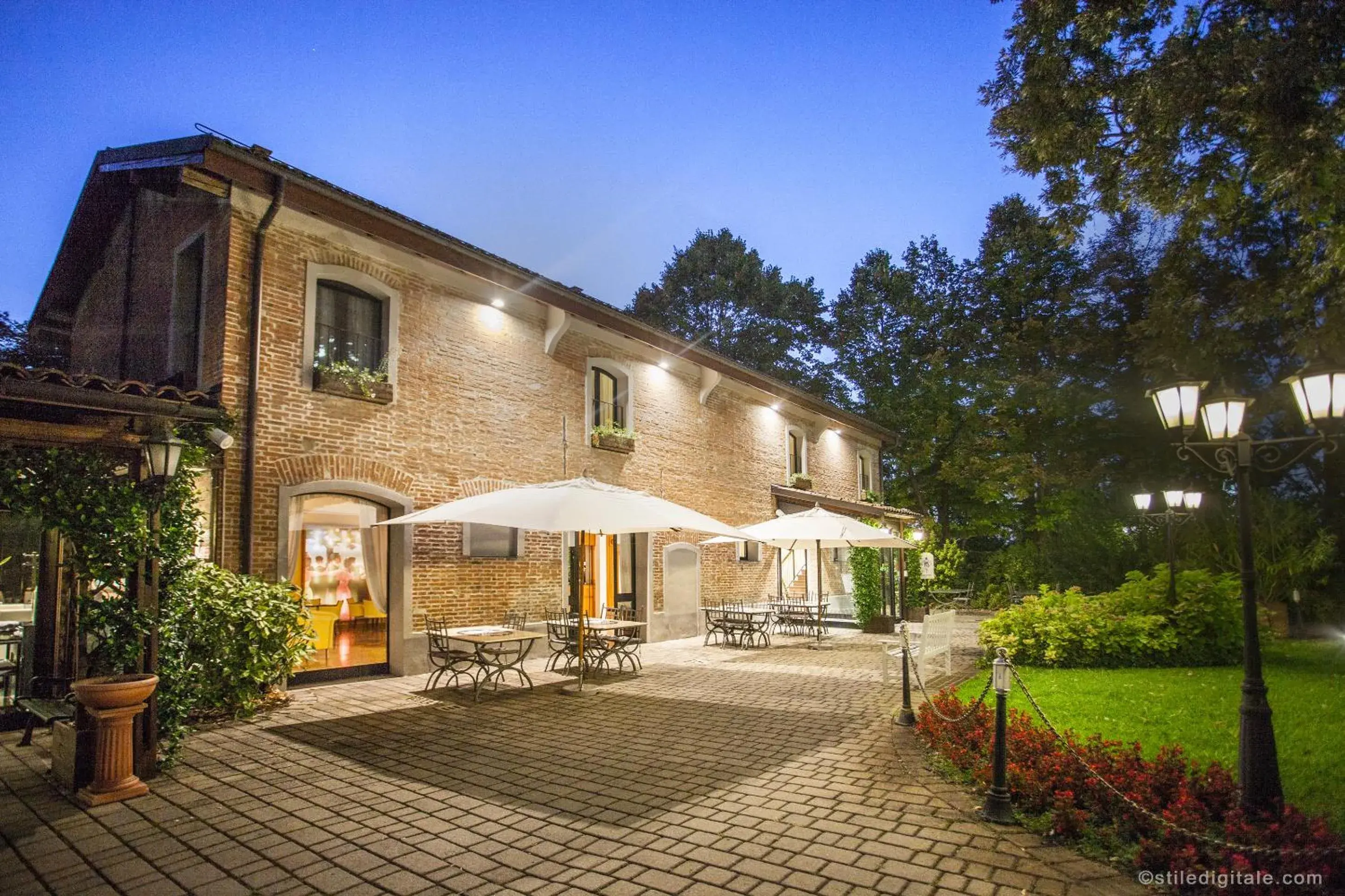 Garden view, Property Building in Savoia Hotel Country House Bologna