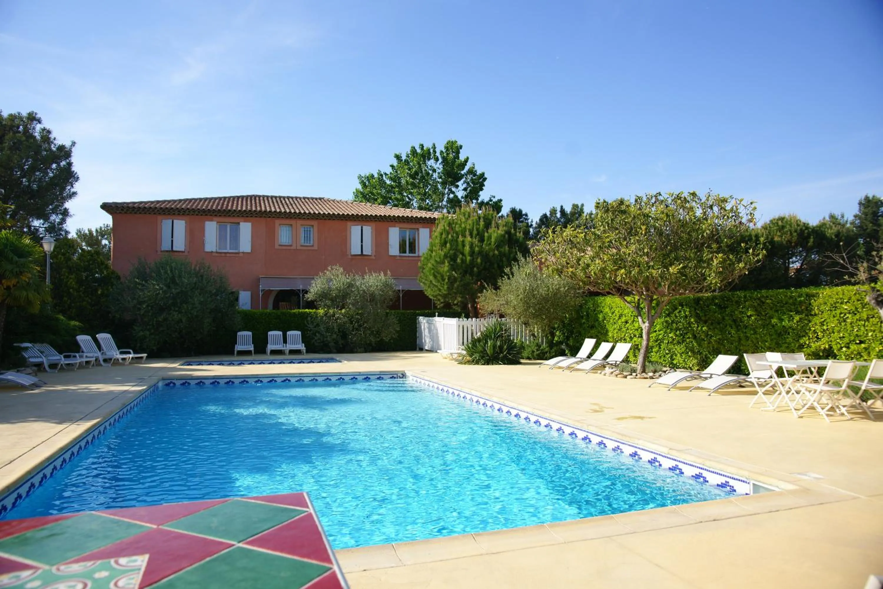 Swimming pool in LOGIS HOTEL & RESTAURANT L'ETAPE Bouc Bel Air - Gardanne