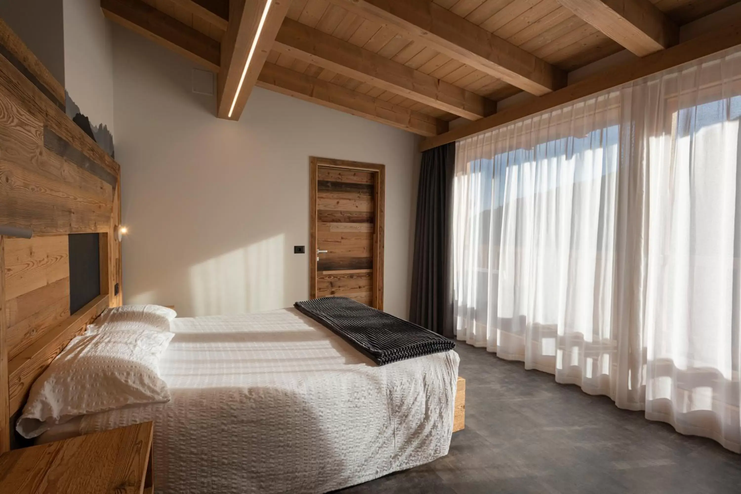 Bed in Albergo Alpino