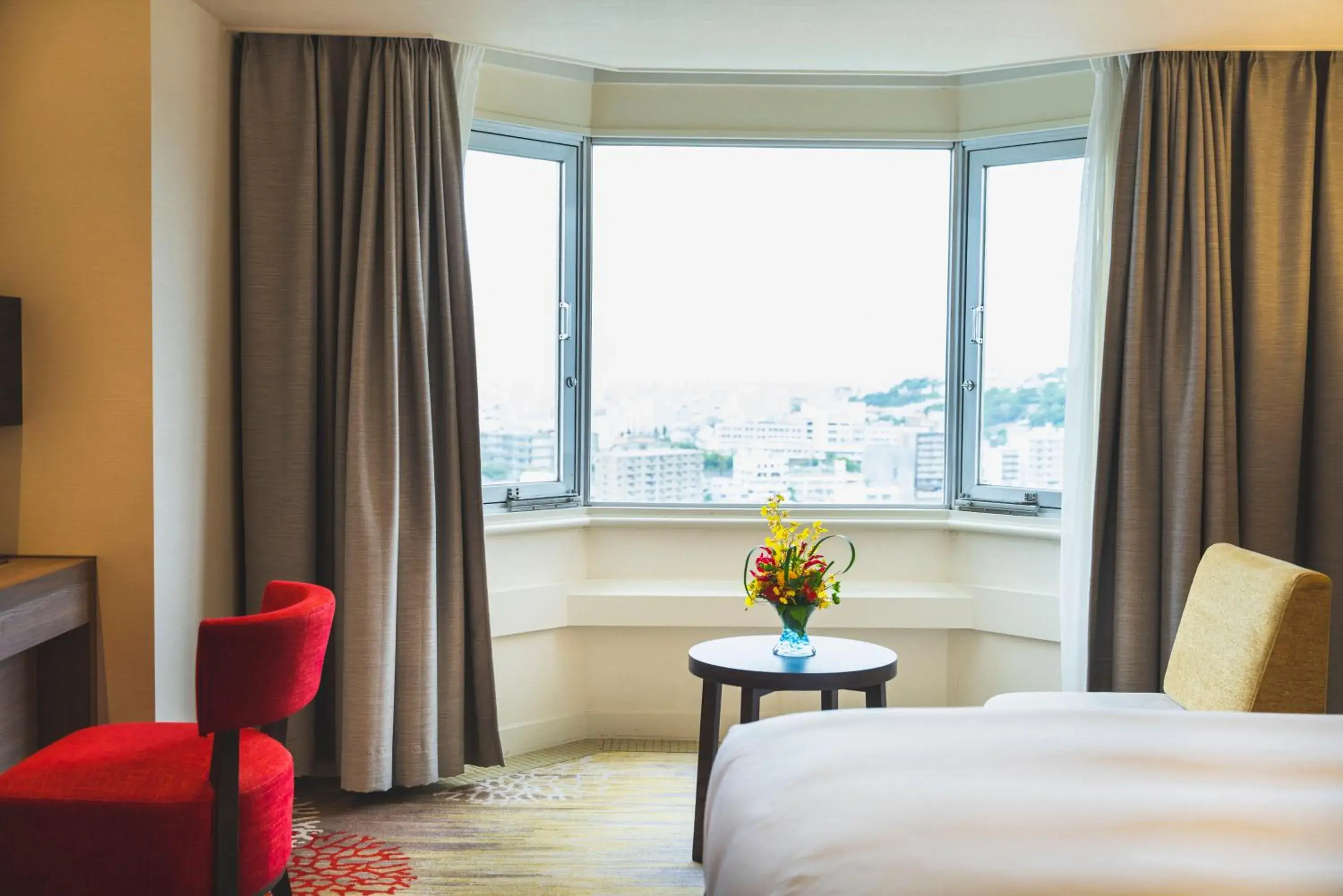 Photo of the whole room, Seating Area in DoubleTree by Hilton Naha Shuri Castle