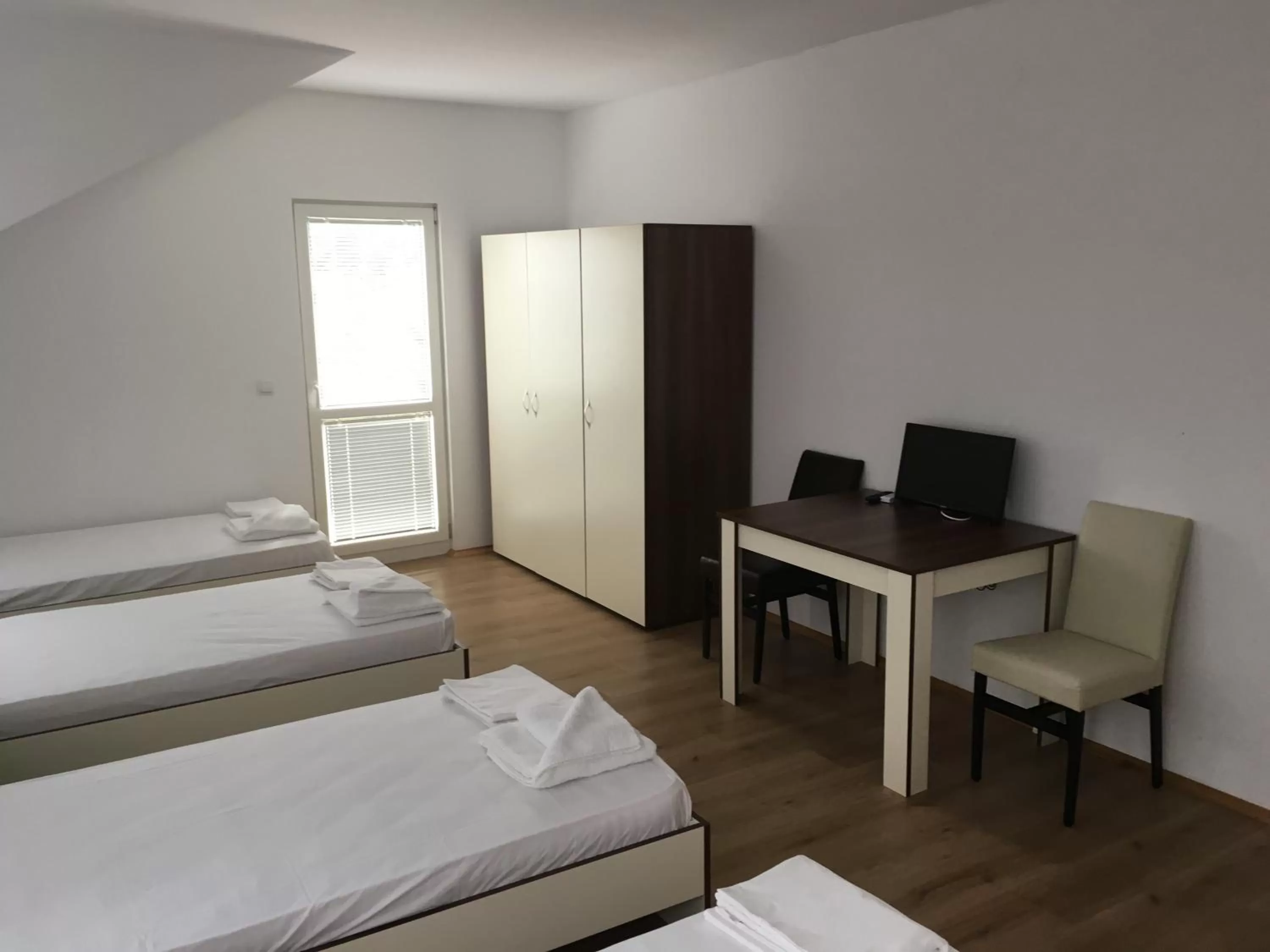 Bed in By The River Hotel