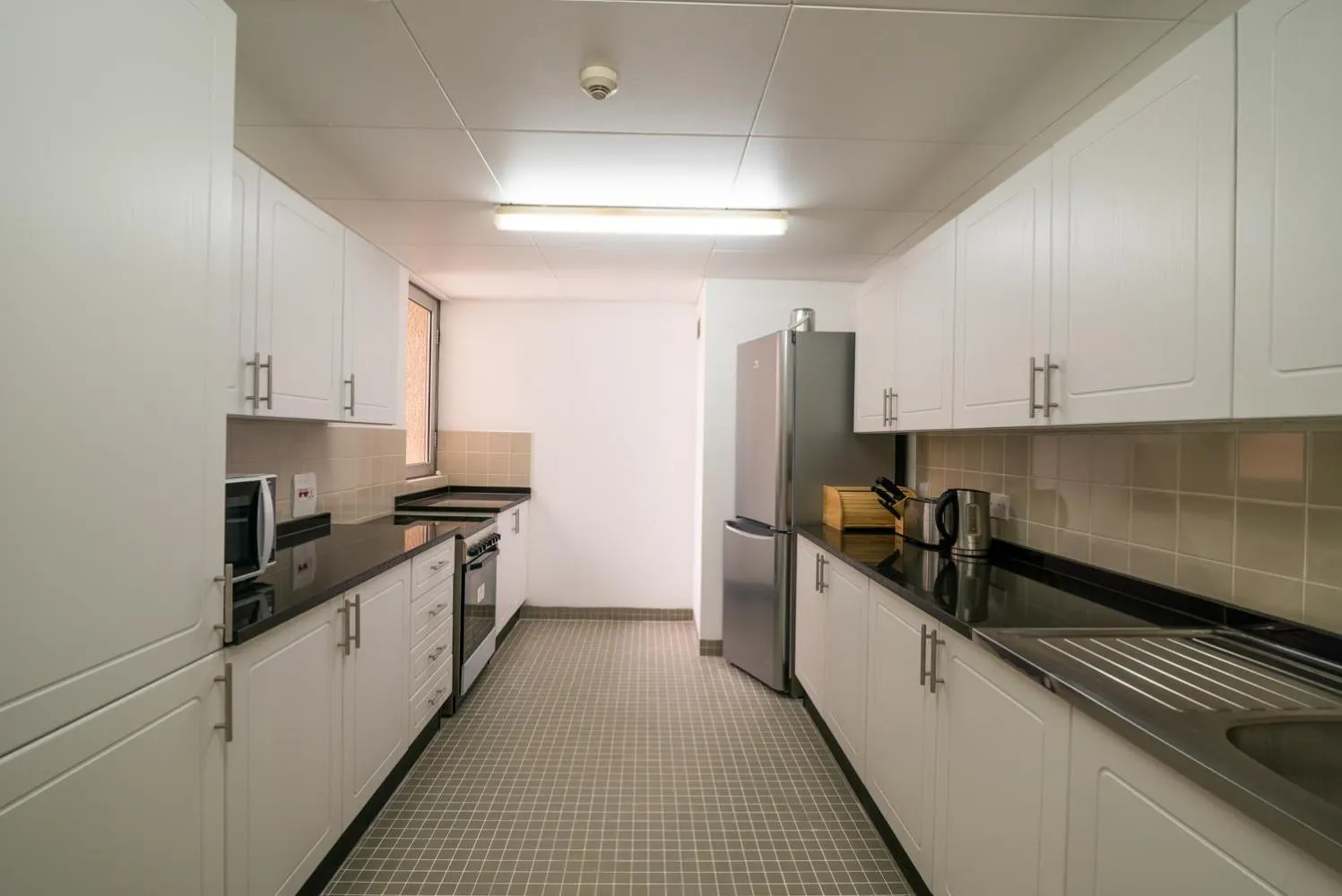 Kitchen or kitchenette in The Apartments, Dubai World Trade Centre