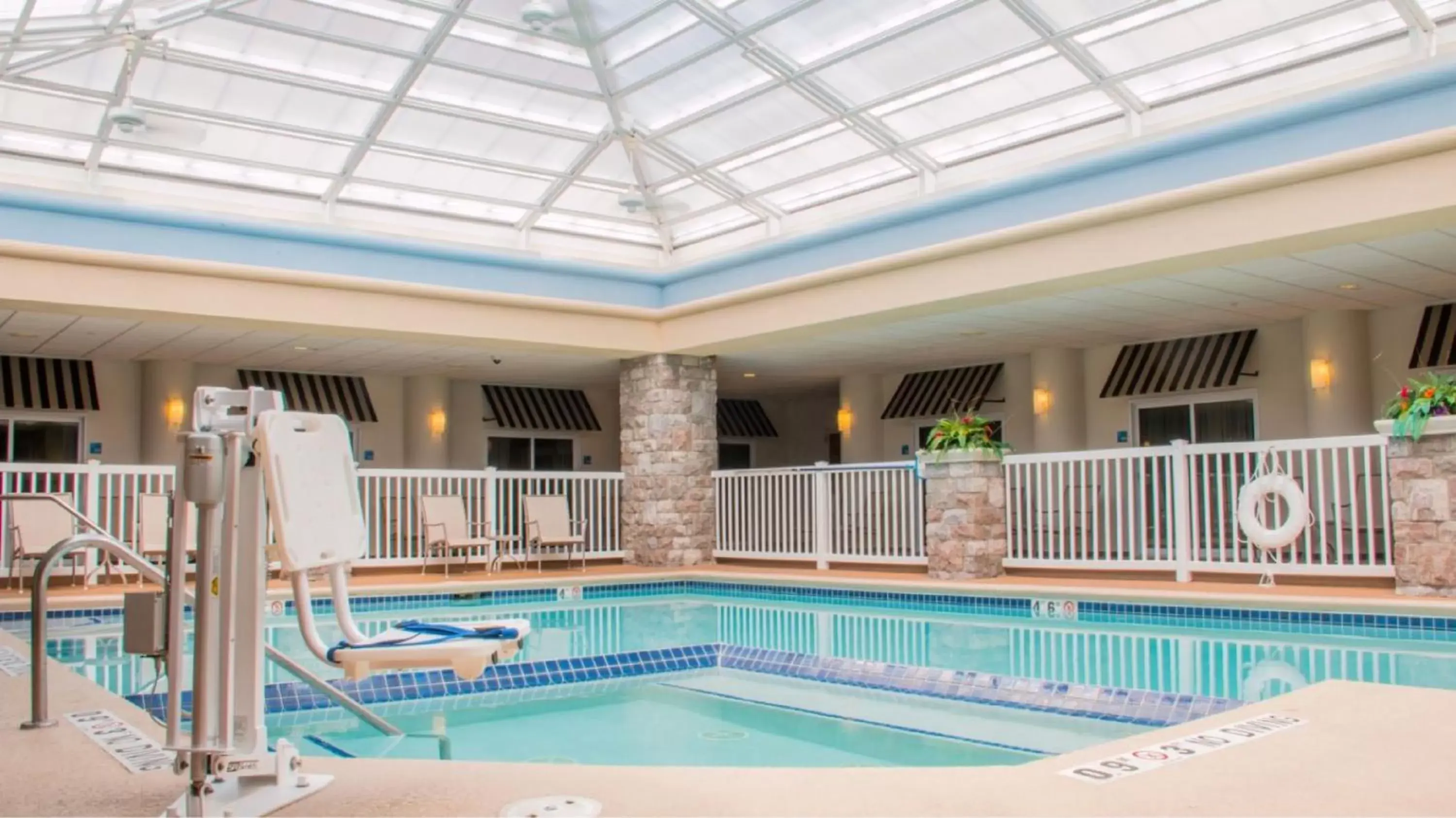 Swimming pool in Holiday Inn Express Hotel & Suites Saginaw, an IHG Hotel