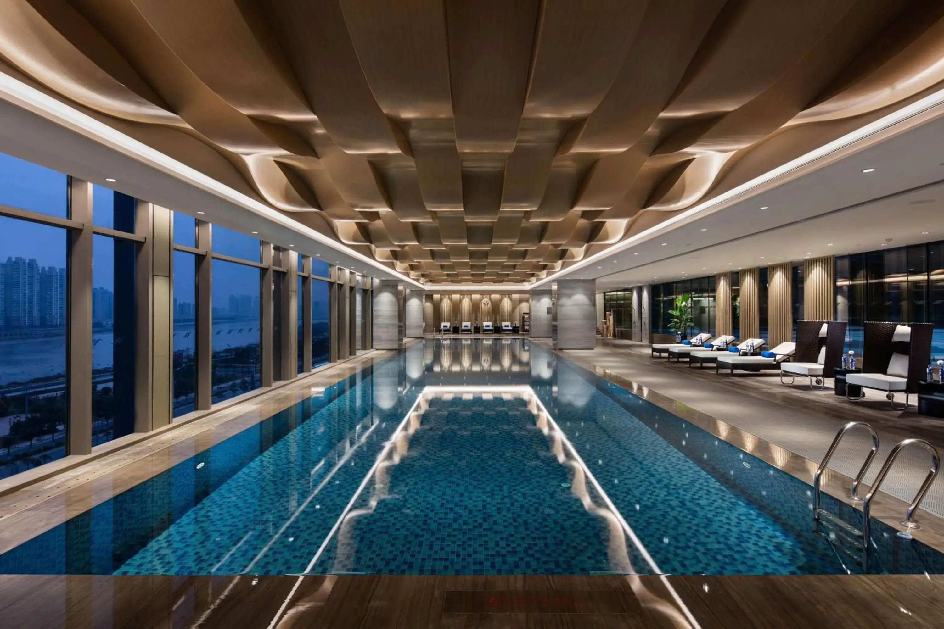 Pool view in Hilton Quanzhou Riverside Pool view in Hilton Quanzhou Riverside