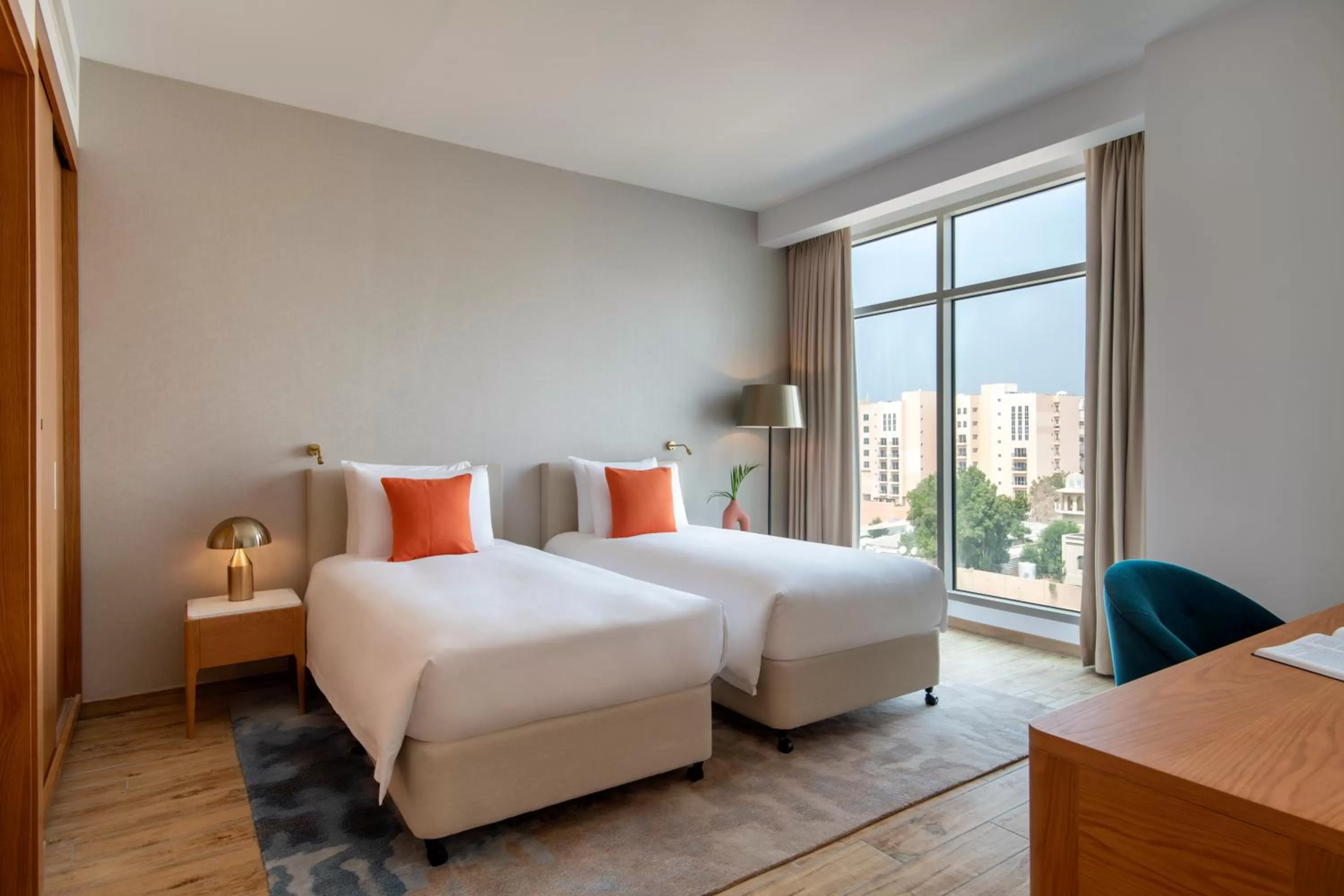 Bed in Abesq Doha Hotel and Residences, an IHG Hotel