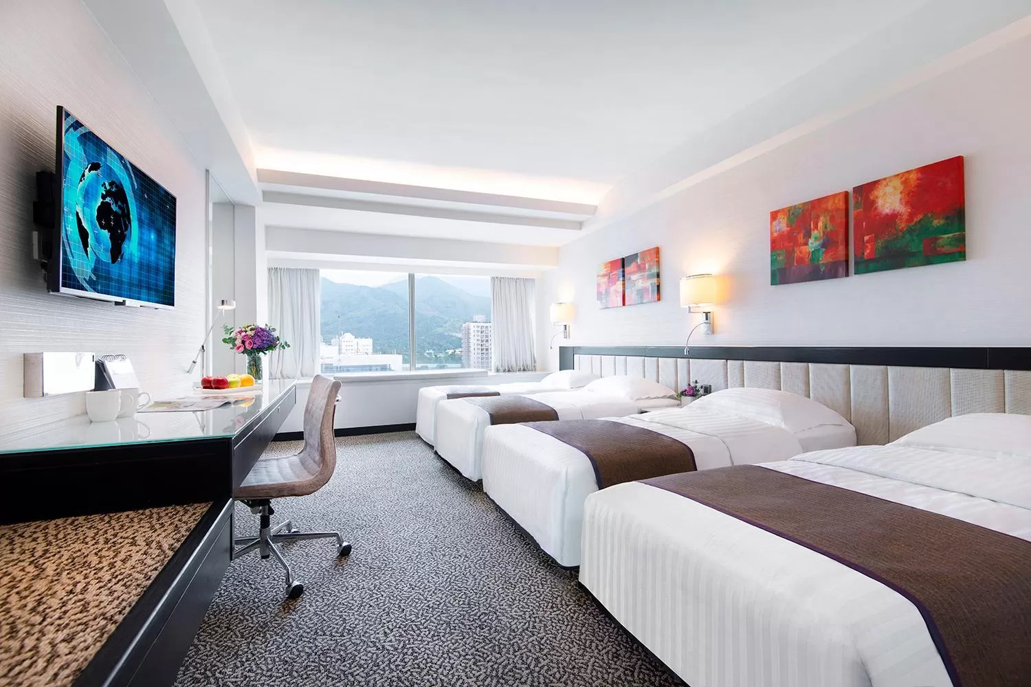 Bed in Regal Riverside Hotel