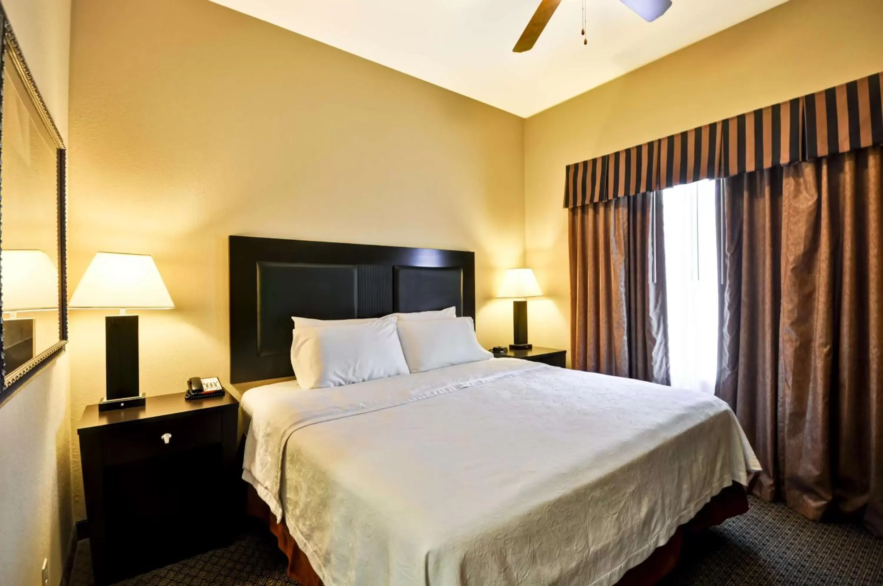 Bed in Homewood Suites by Hilton Tulsa-South