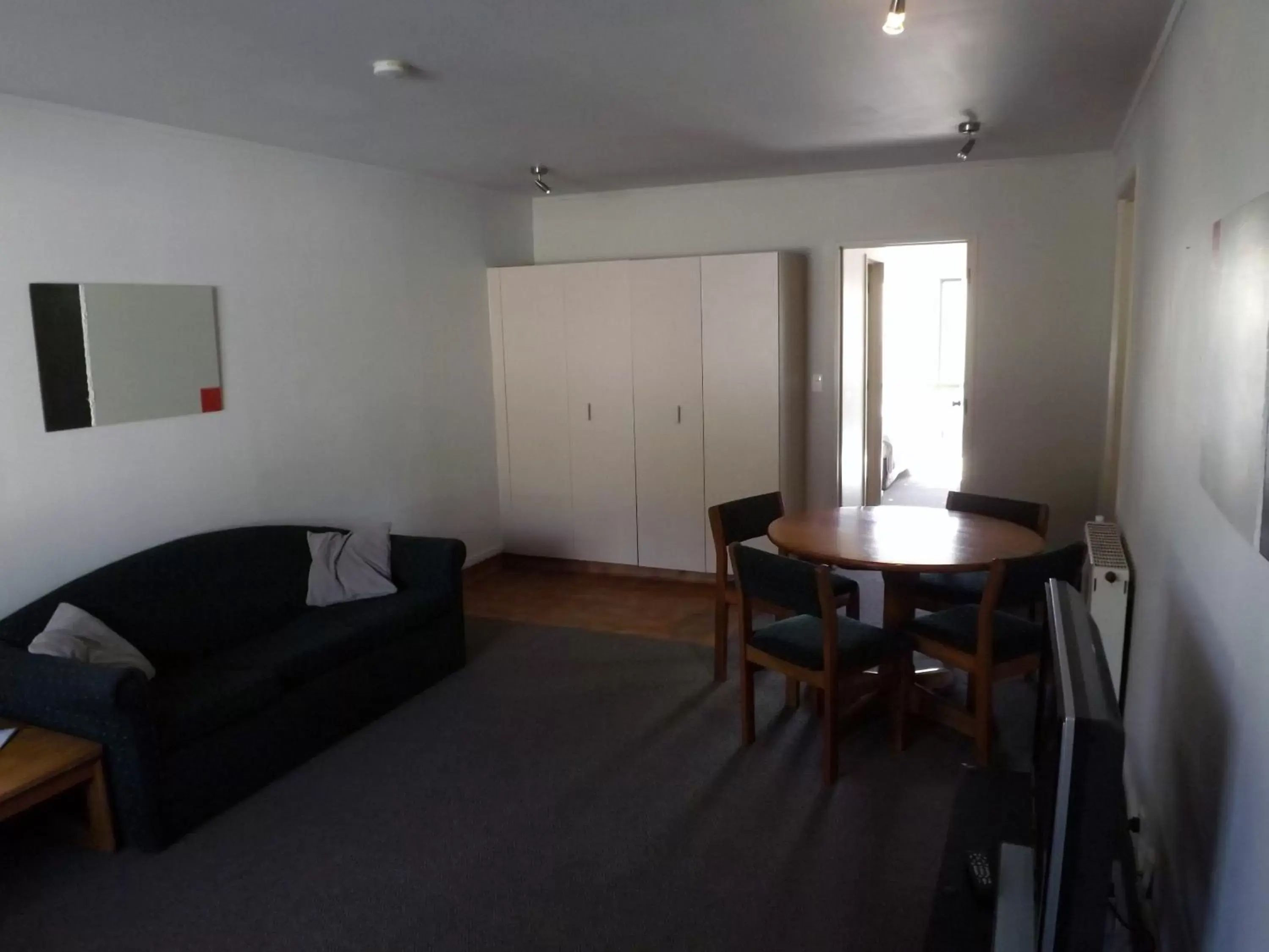 Photo of the whole room, Seating Area in Karaka Tree Motel