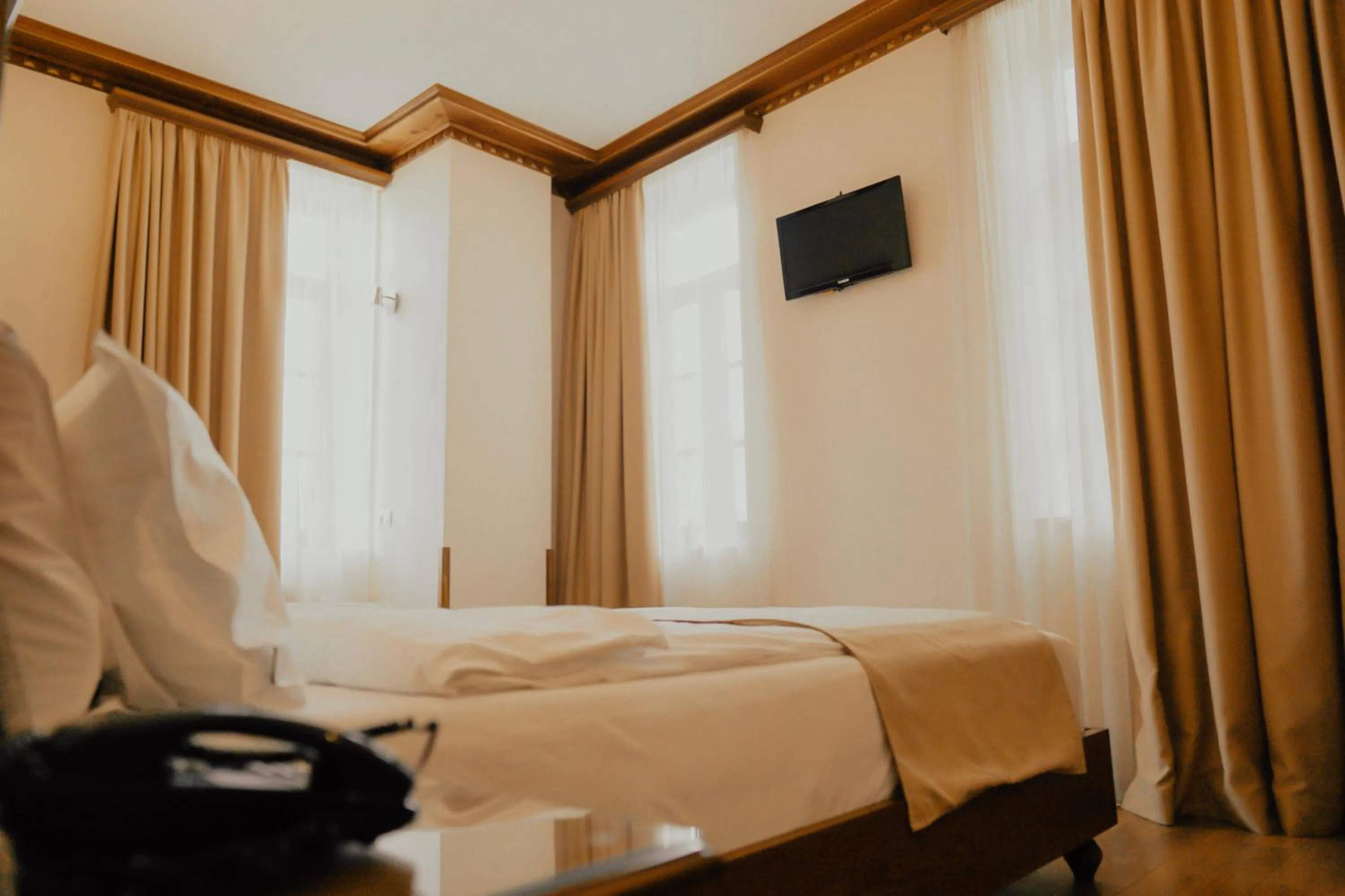 Bed in Hotel Argjiro