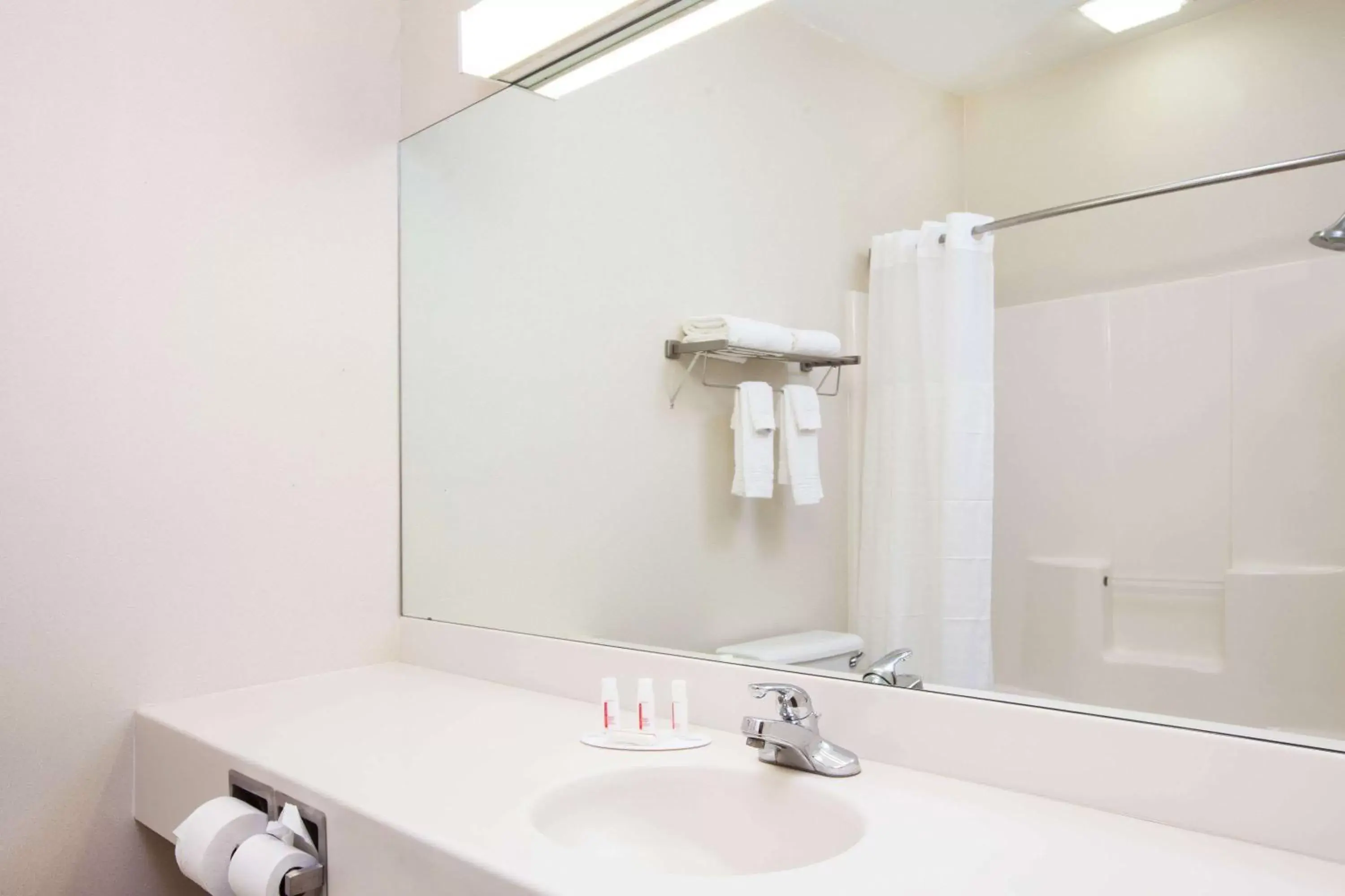 Bathroom in Days Inn by Wyndham Brewerton/ Syracuse near Oneida Lake