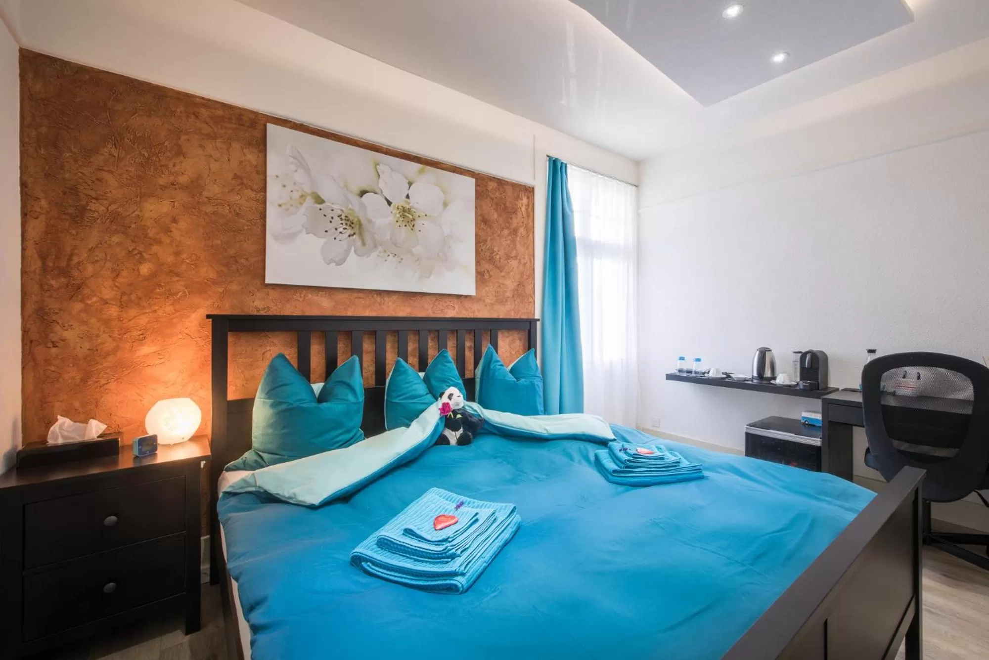 Bed in Max Aviation Villa & Apartments