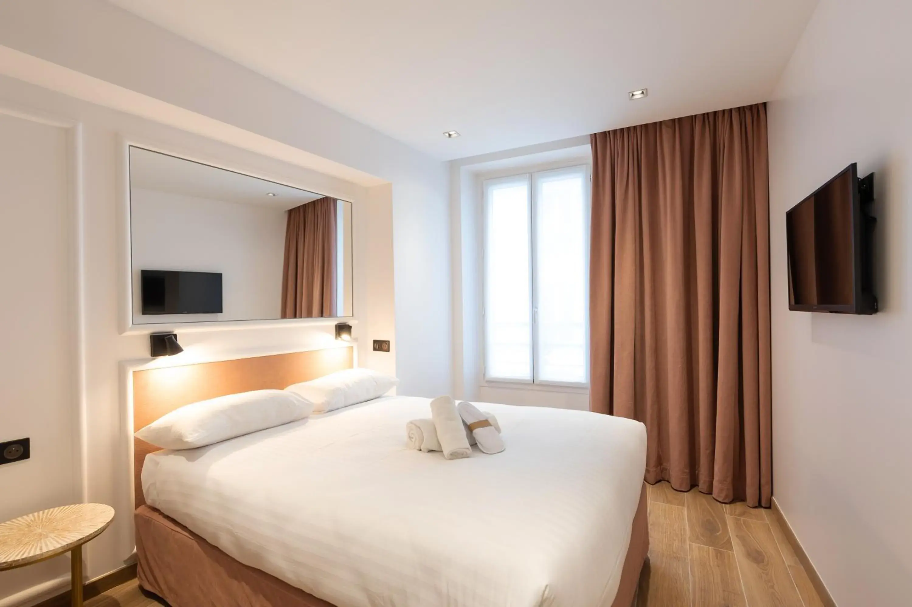 Photo of the whole room, Bed in HOTEL AU COEUR DE REPUBLIQUE