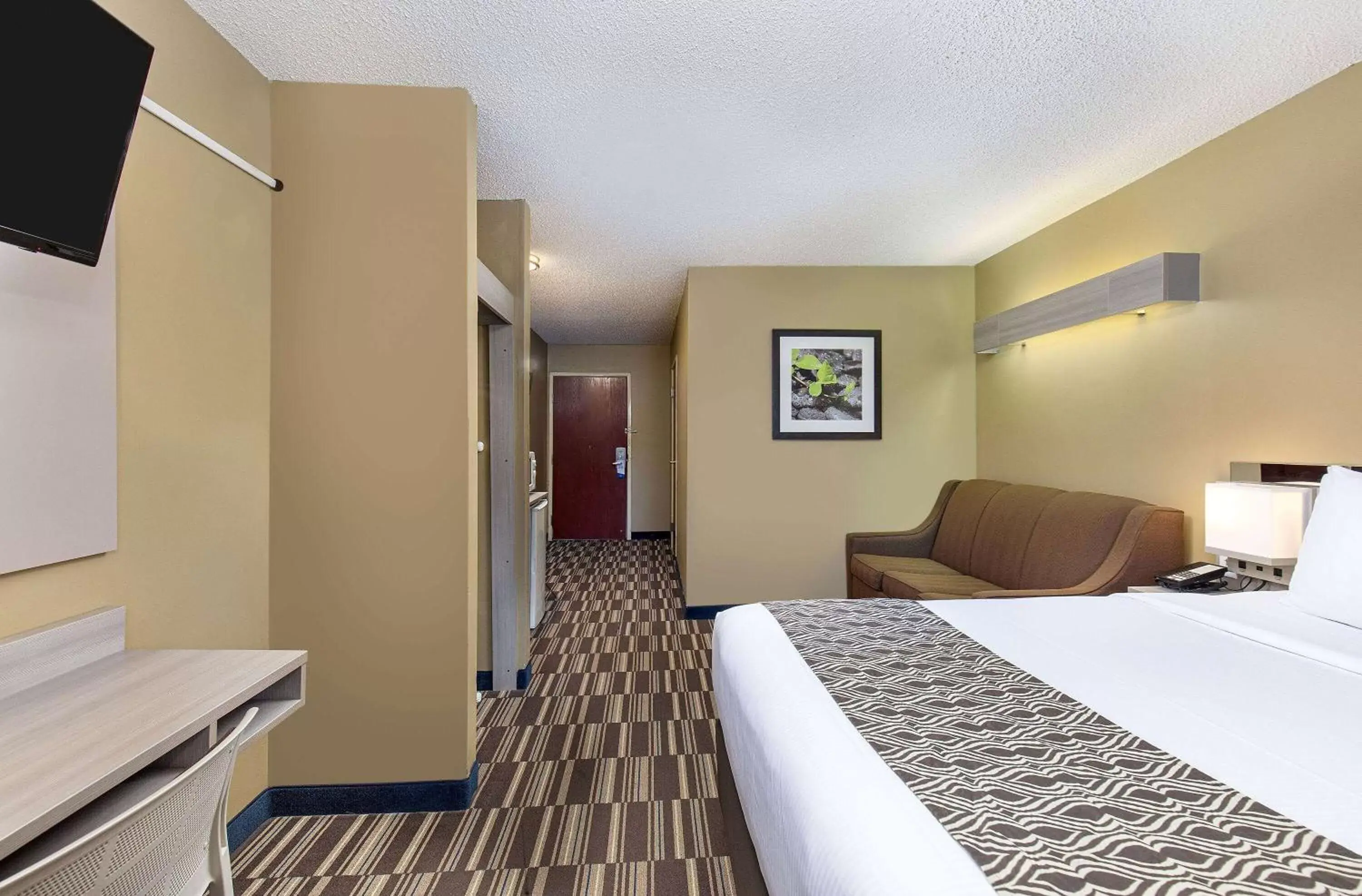 Bed in Microtel Inn & Suites by Wyndham Dry Ridge