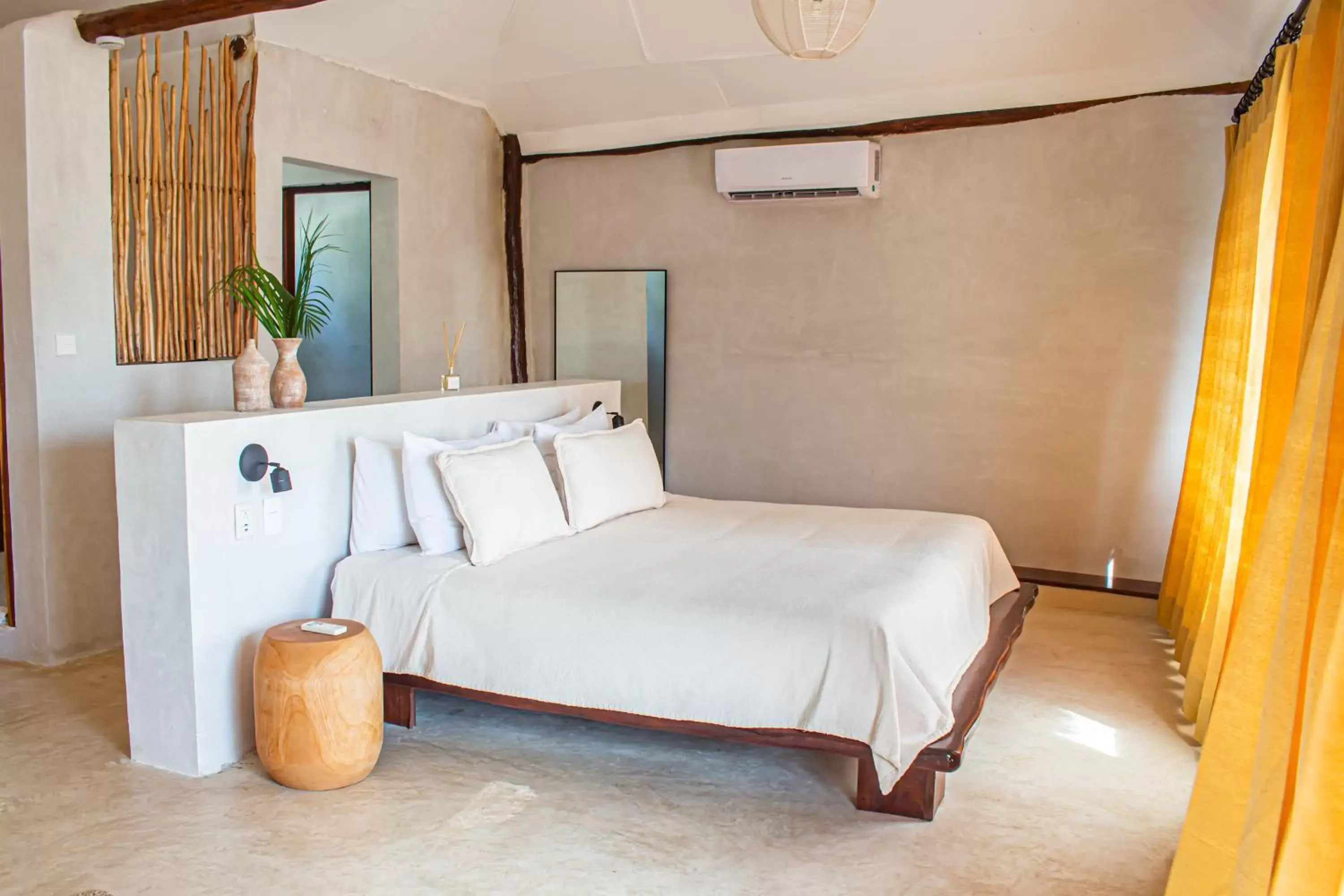 Bed in Dune Boutique Hotel located at the party zone