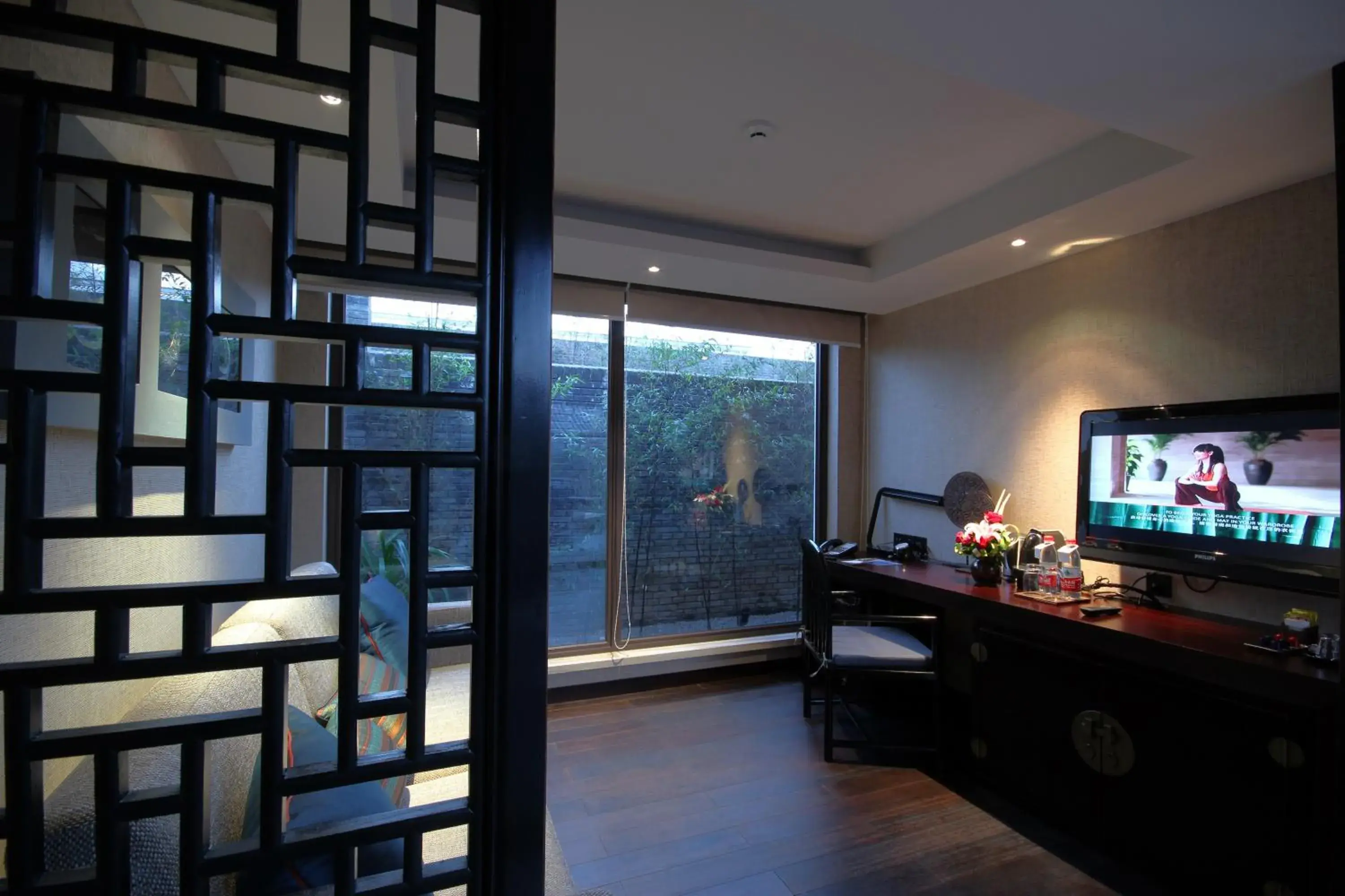 Living room, TV/Entertainment Center in Pullman Lijiang Resort & Spa