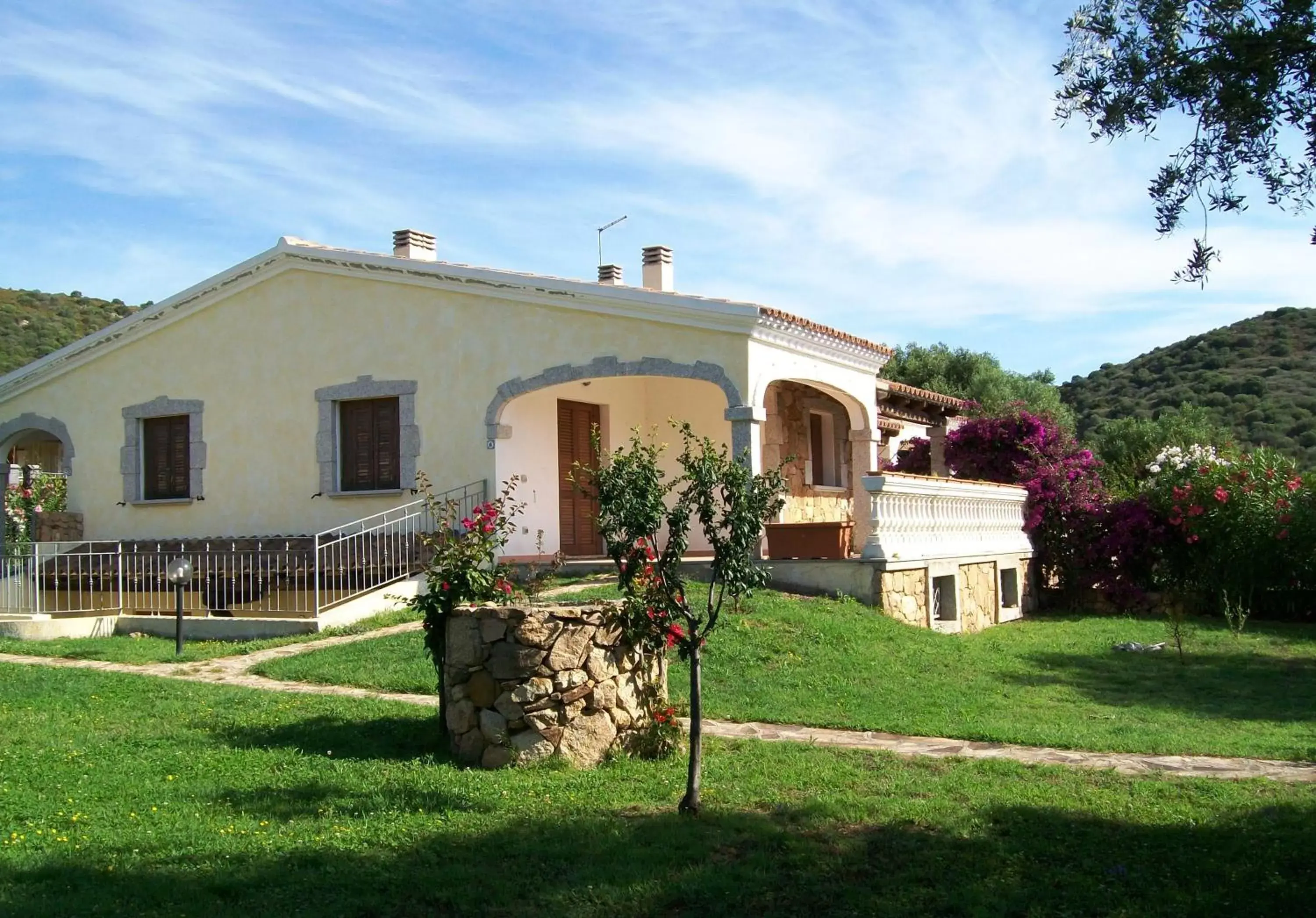 Facade/entrance, Property Building in Porto Ottiolu Resort