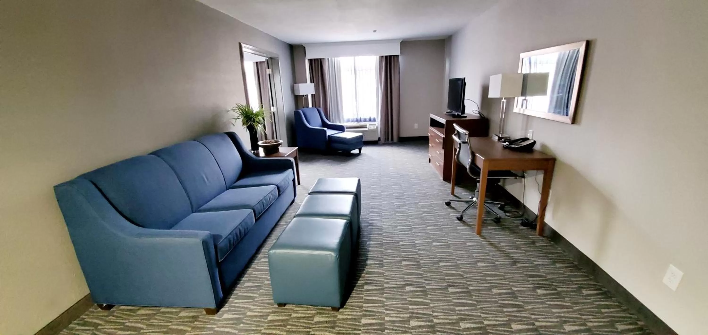 Living room in Wingate by Wyndham Tupelo