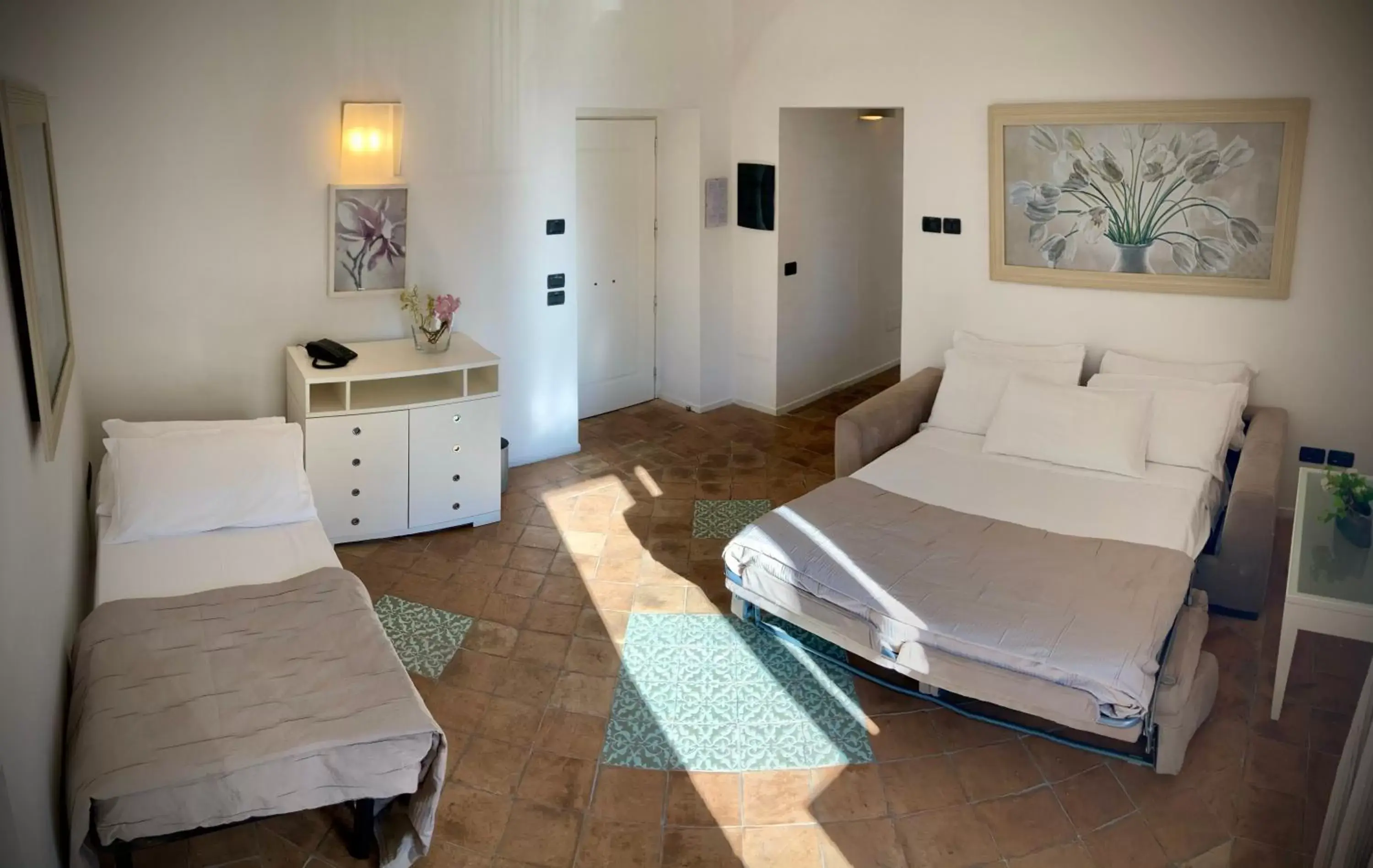 Quadruple Room in Miglio d'Oro Park Hotel Quadruple Room in Miglio d'Oro Park Hotel