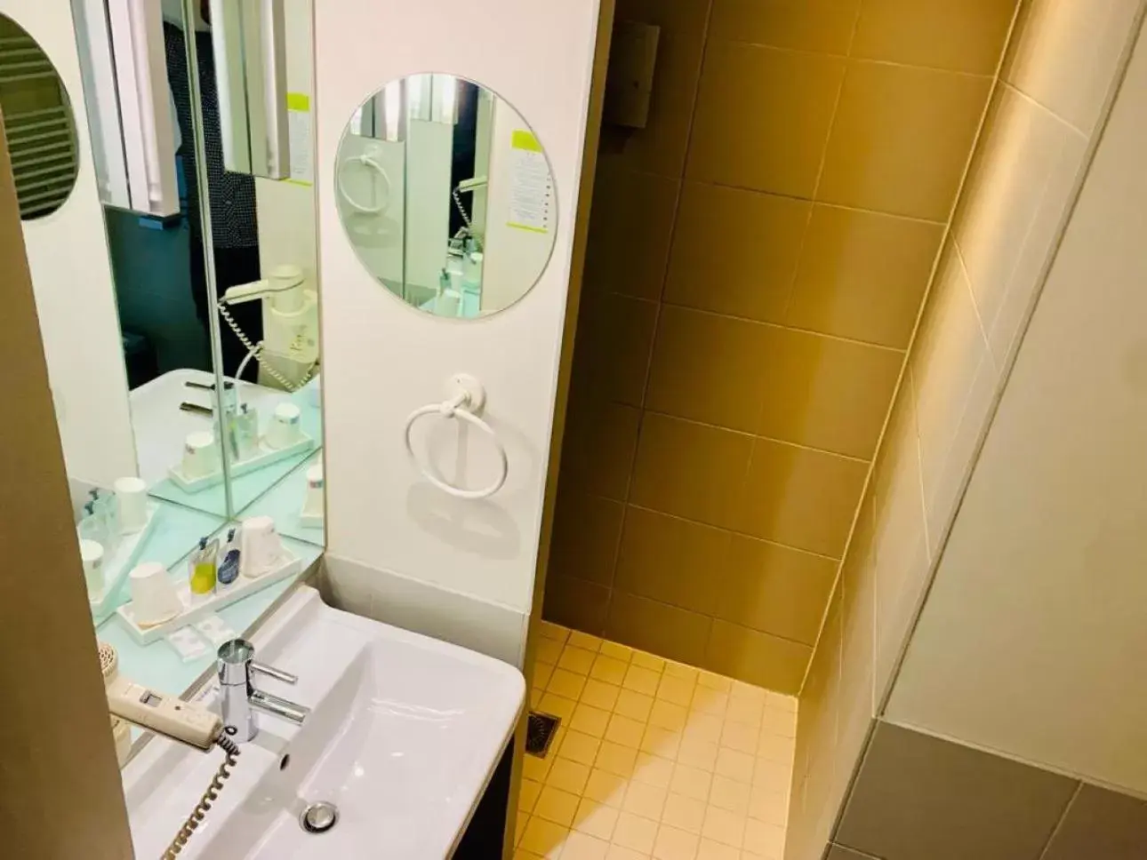 Shower, Bathroom in Standing Hotel Suites by Actisource