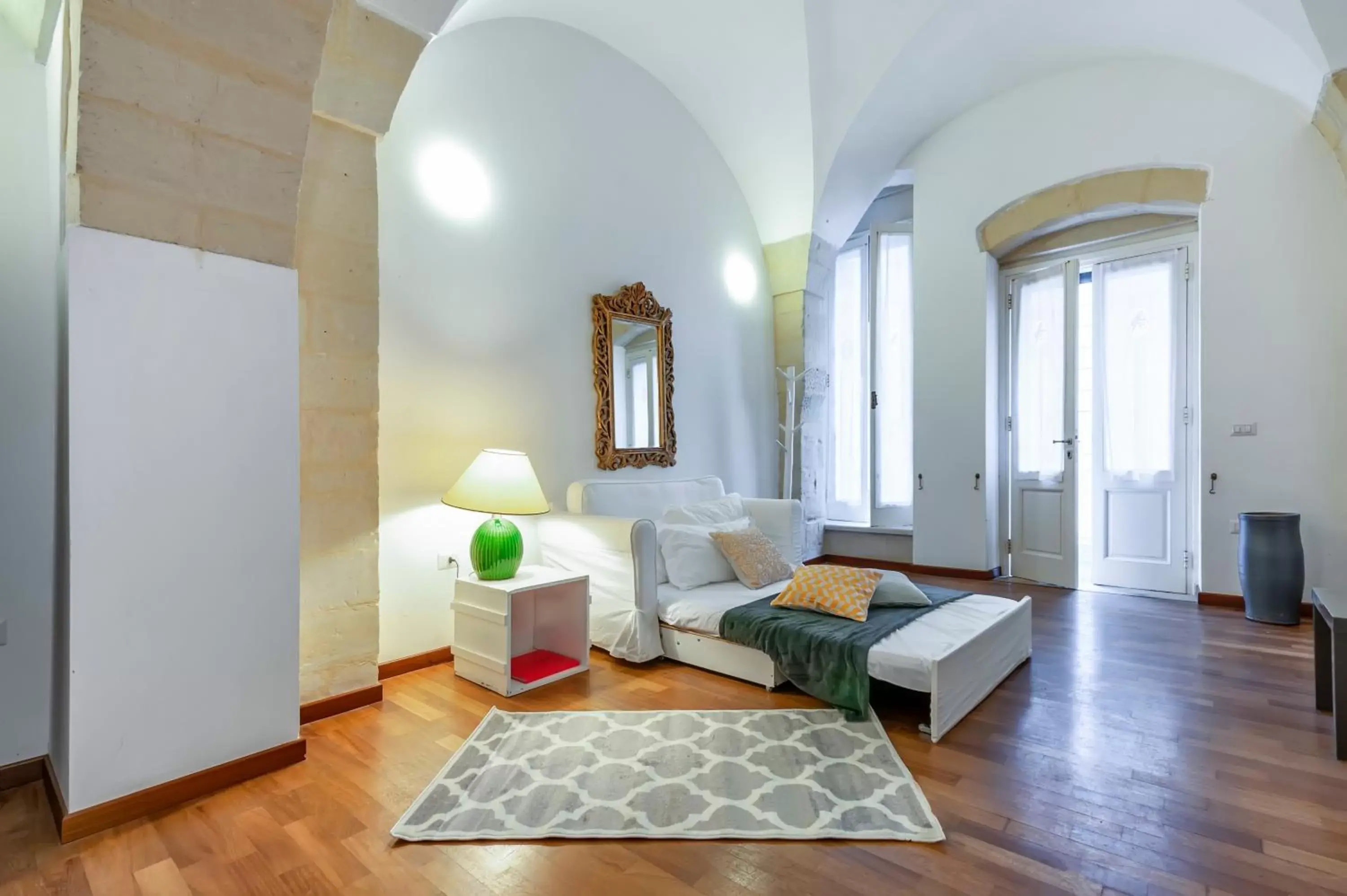 Bed, Seating Area in Yellow Loft - Old Town Apartment SIT