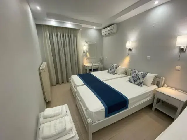 Bed in Ifestos Hotel