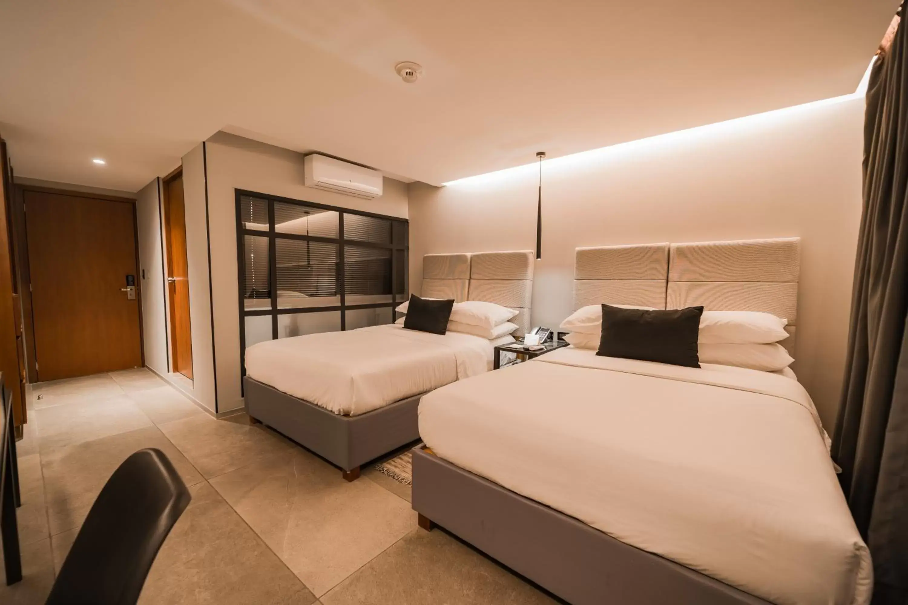 Bed in Ontico Urban Design Hotel